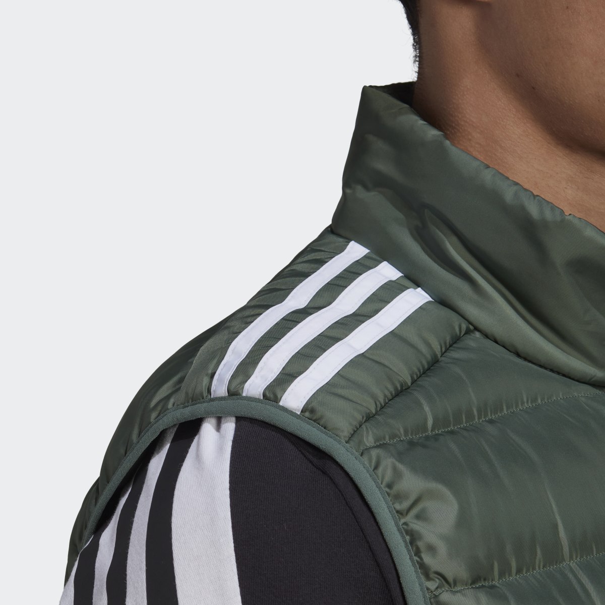 Adidas Doudoune sans manches Essentials. 8