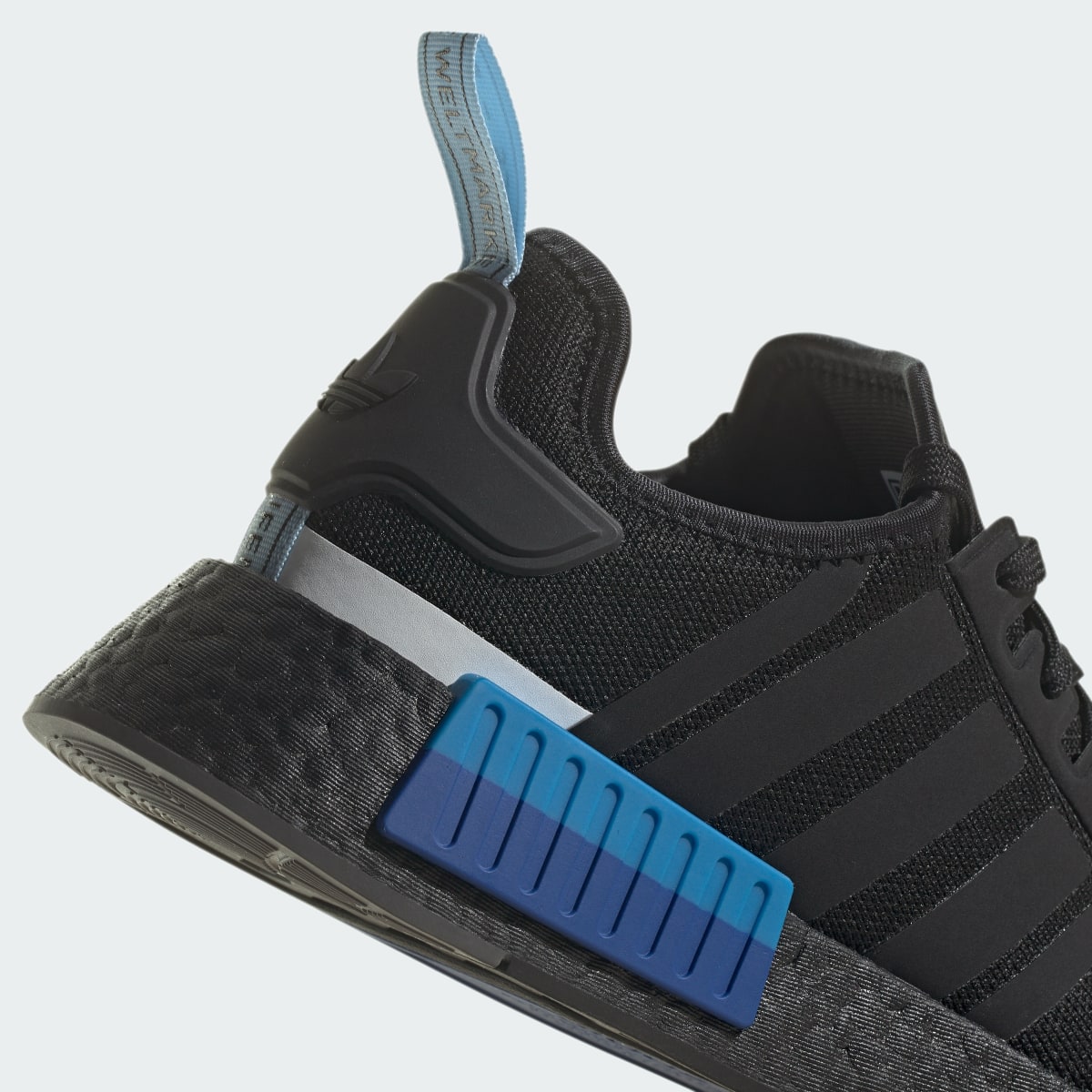 Adidas Tenis NMD_R1. 9