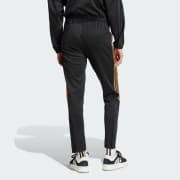 Adidas pants with stripes halfway down on sale