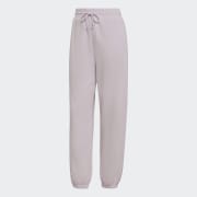 Pink adidas track pants hot sale