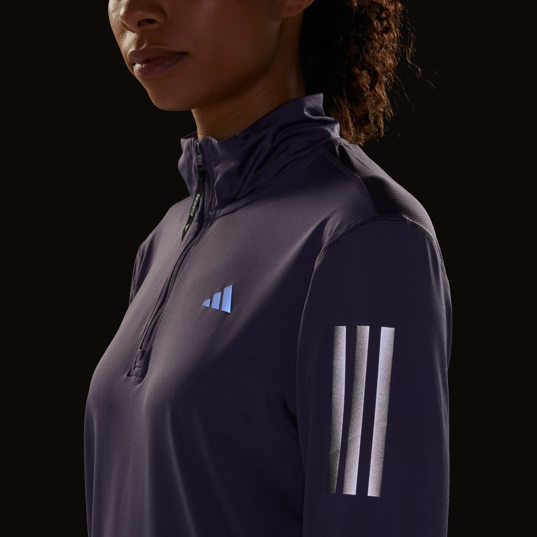 Jachetă Own the Run cu fermoar 1/2