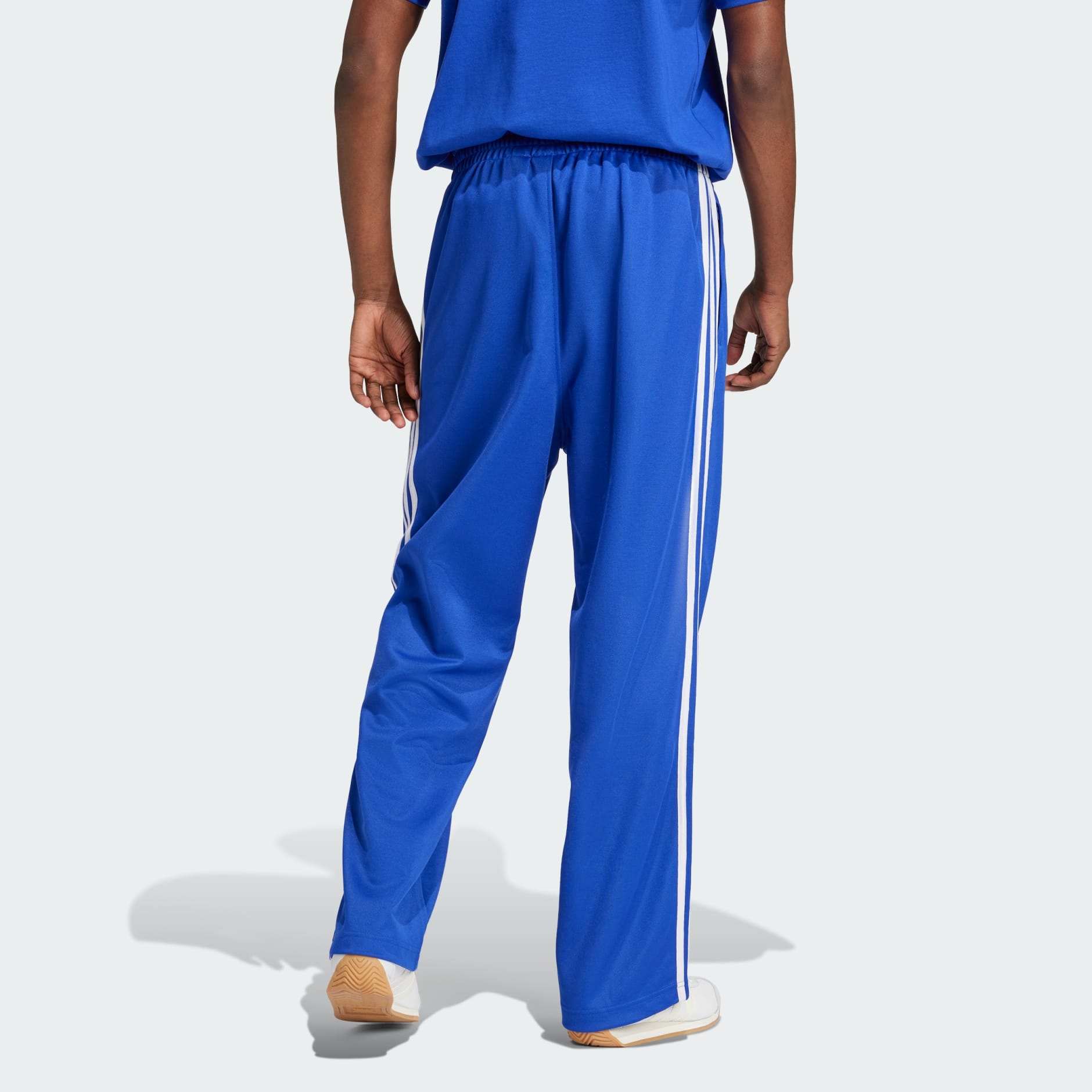 Adidas track pants baggy best sale