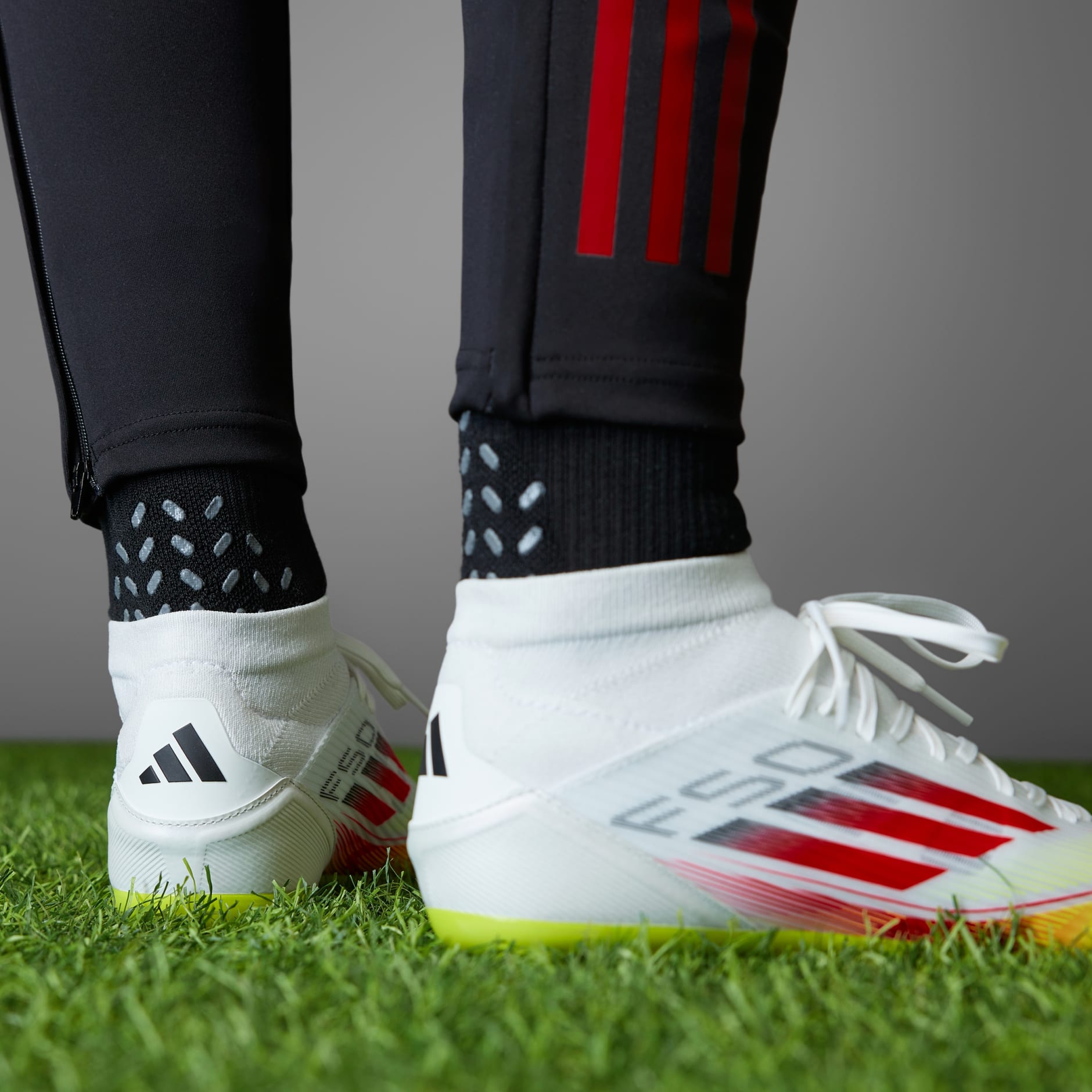 Ghete de fotbal F50 League pentru teren dur/multi-teren