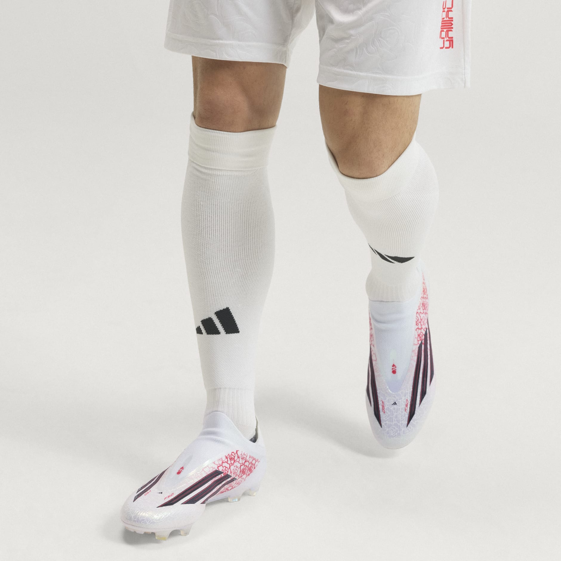 Ghete de fotbal F50 ELITE LAMINE YAMAL fără șireturi pentru teren dur