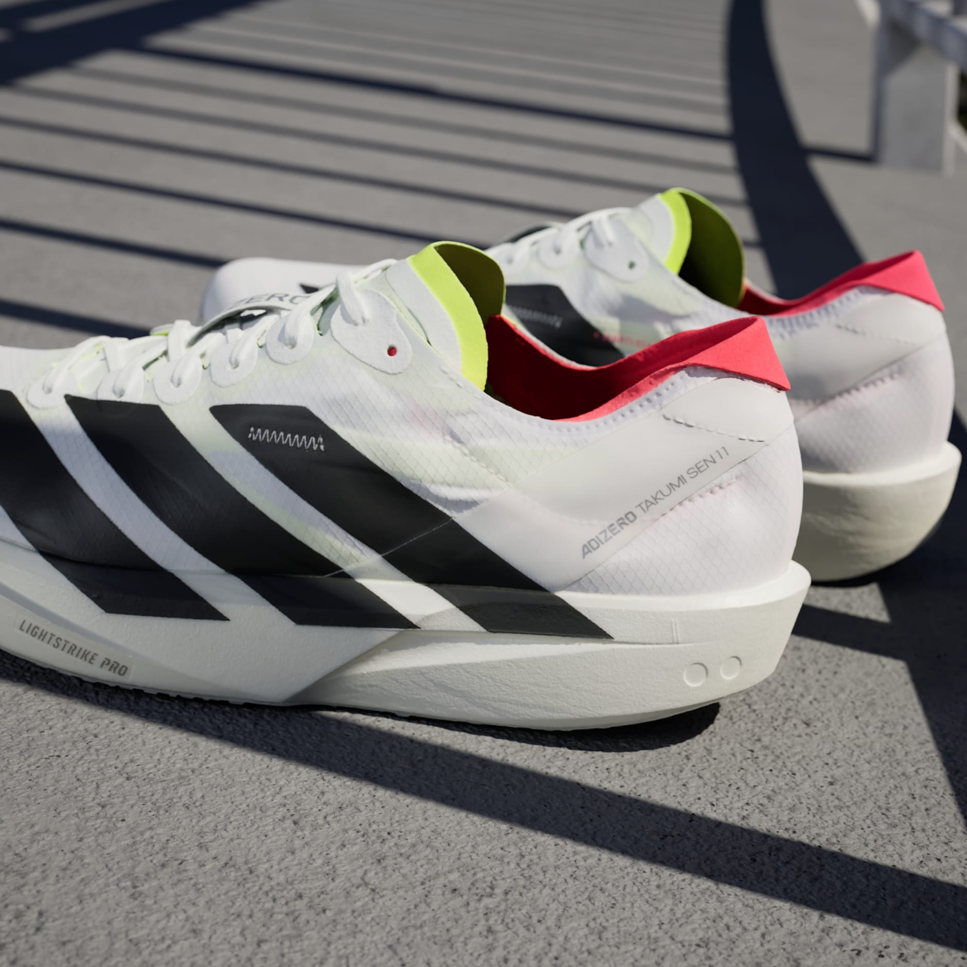 Shoes - Adizero Takumi Sen 11 Shoes - White | adidas Oman