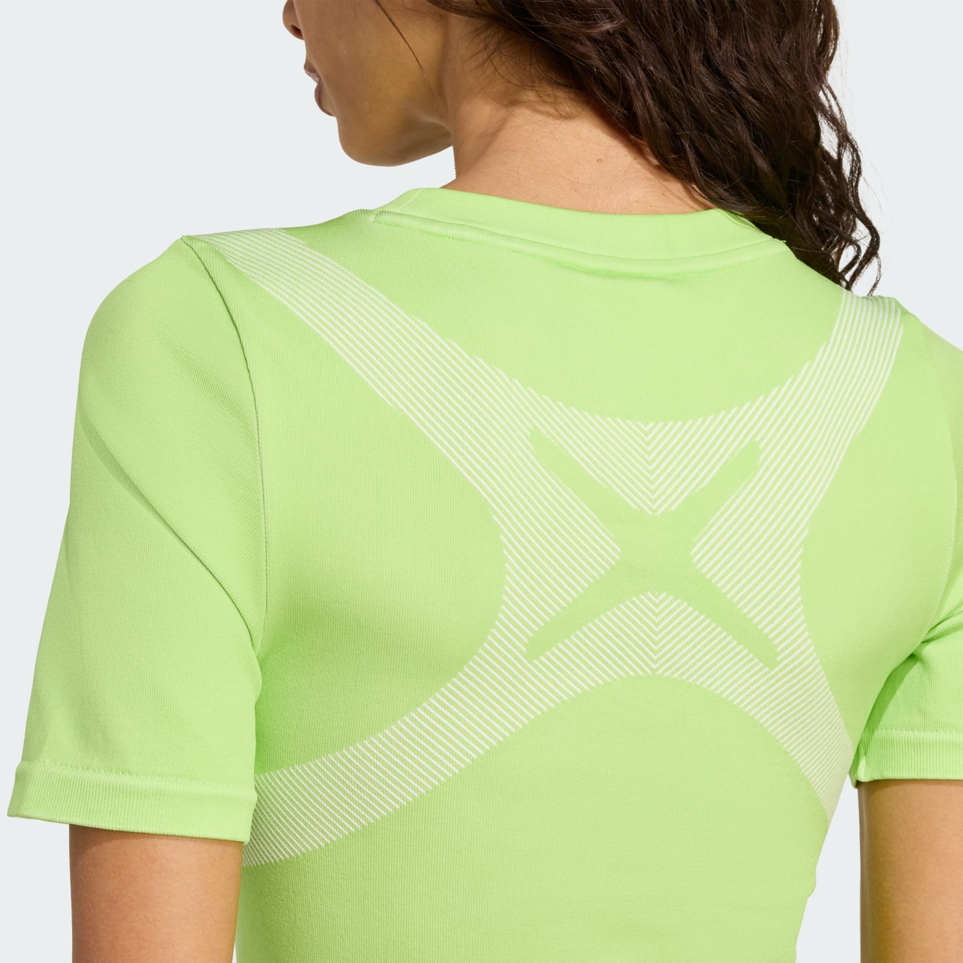 CLOTHING - Seamless Techfit Baby Tee - Green | adidas Oman