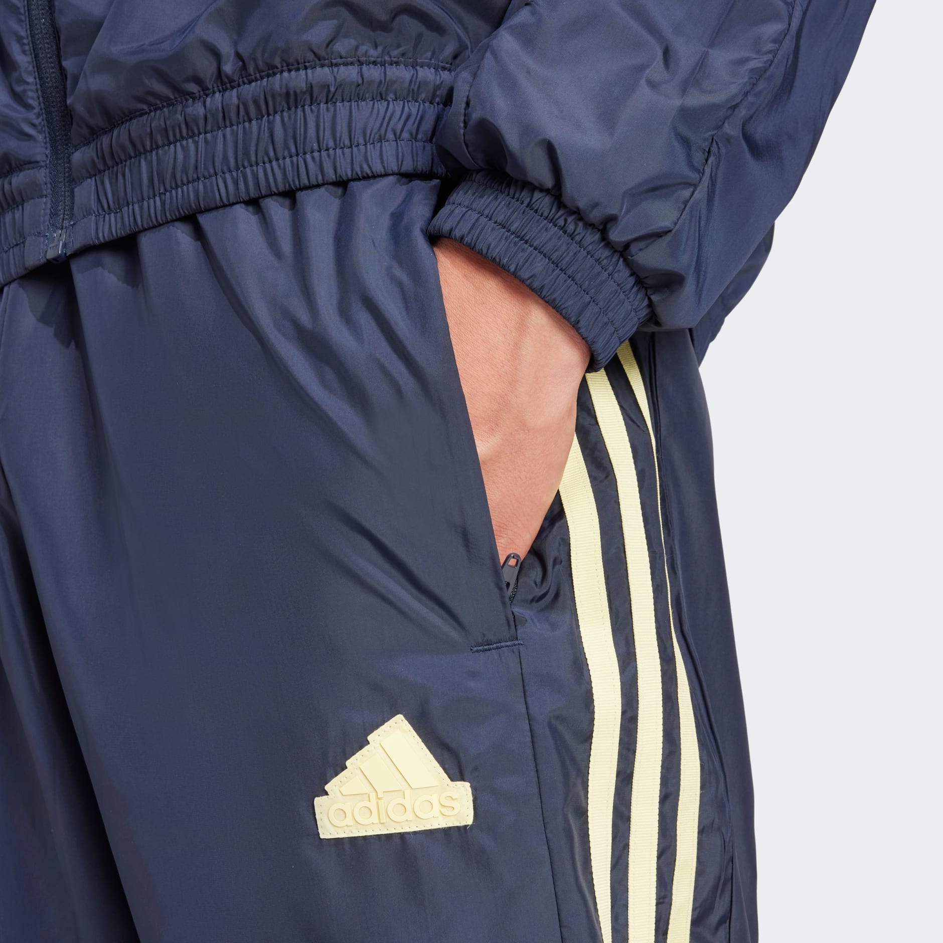 Adidas men's essential woven pants online