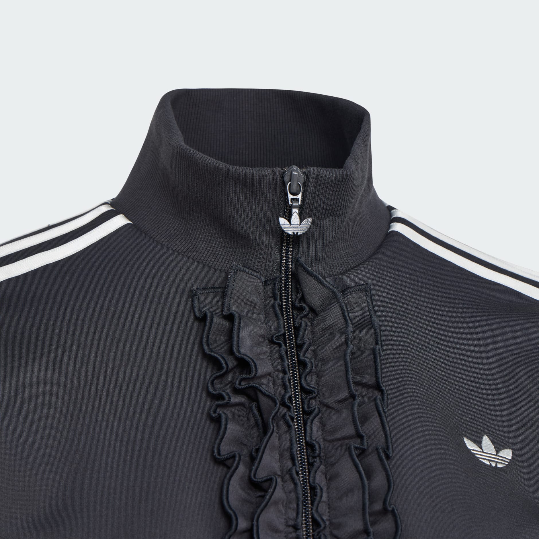 RUFFLE TRACK TOP