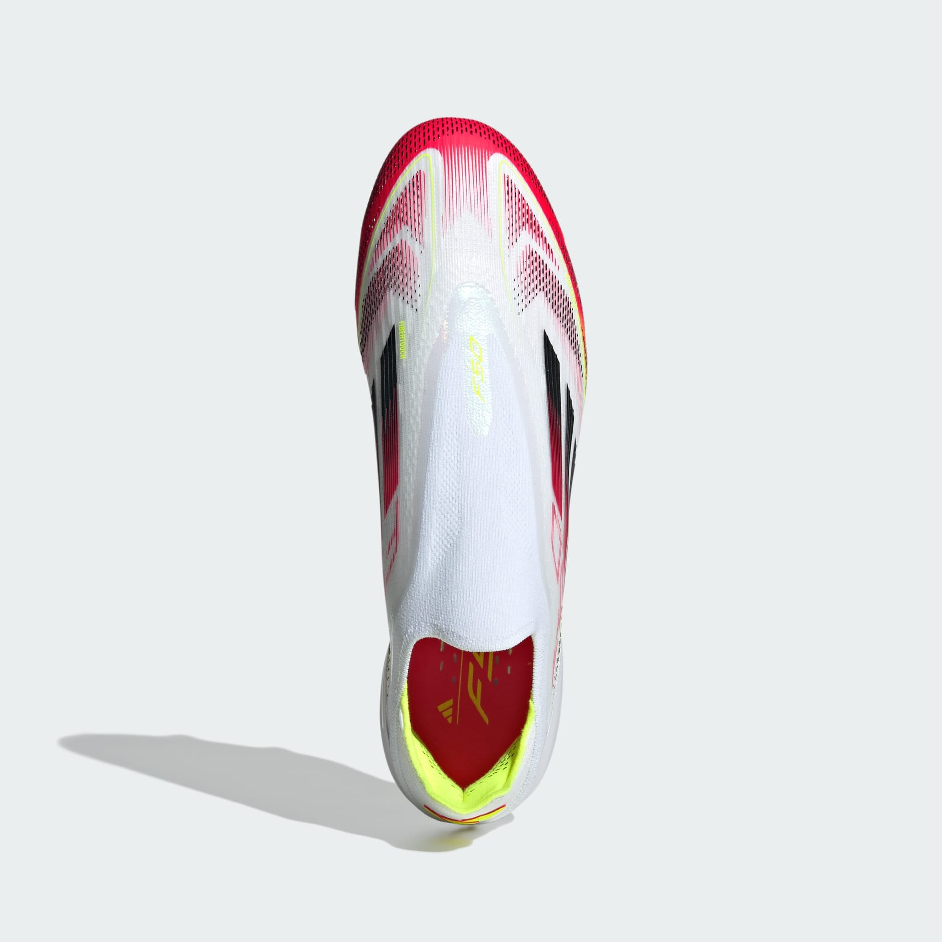 Ghete F50 Elite fără șireturi, pentru teren moale