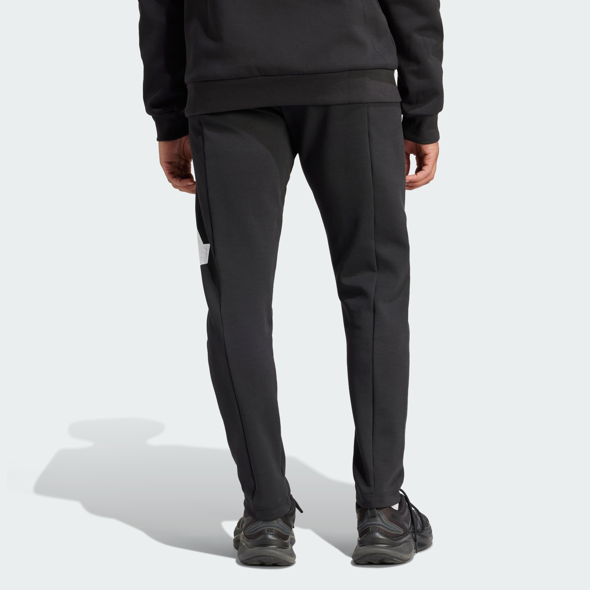 Adidas solid men's black track pants online