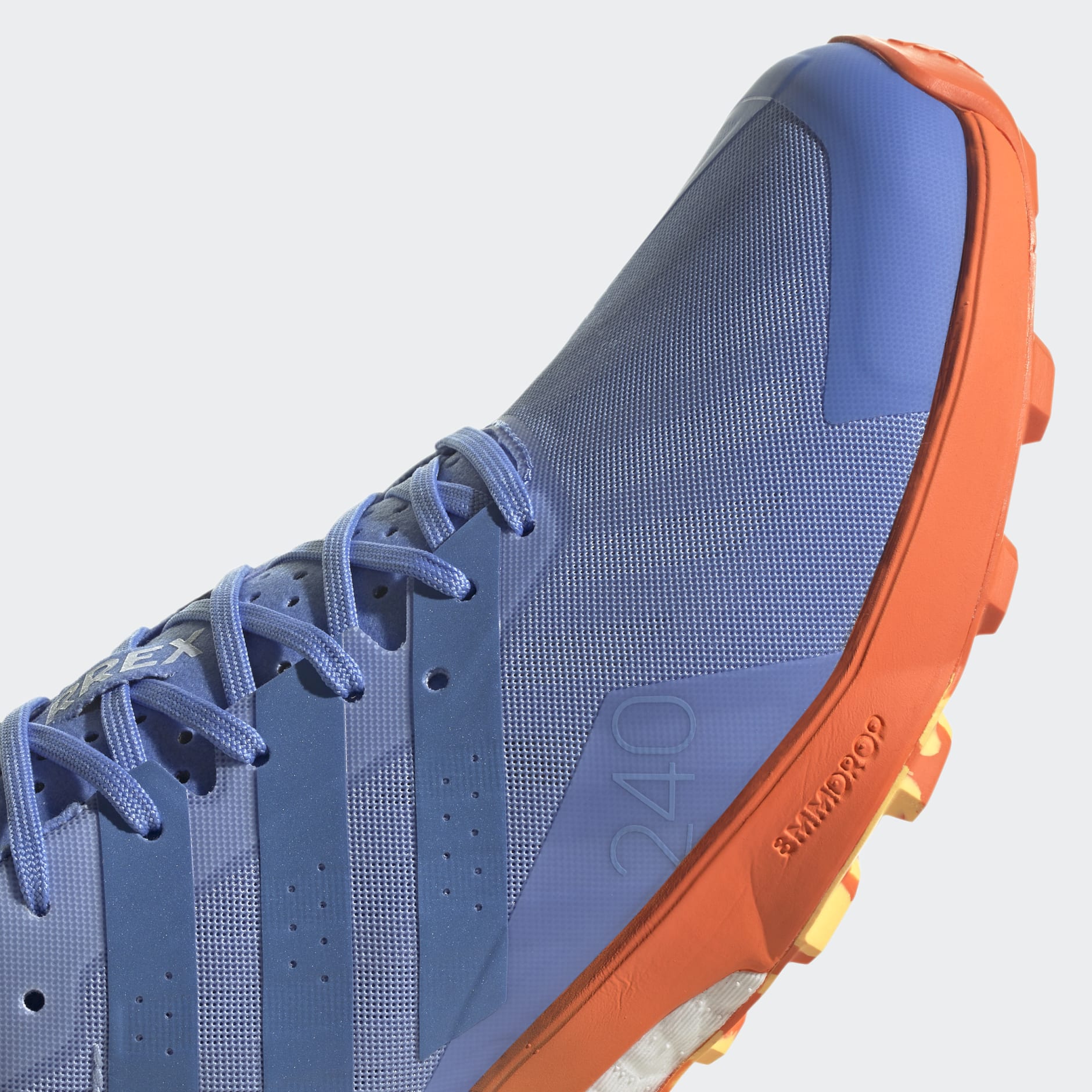 Adidas blue and 2025 orange hockey shoes