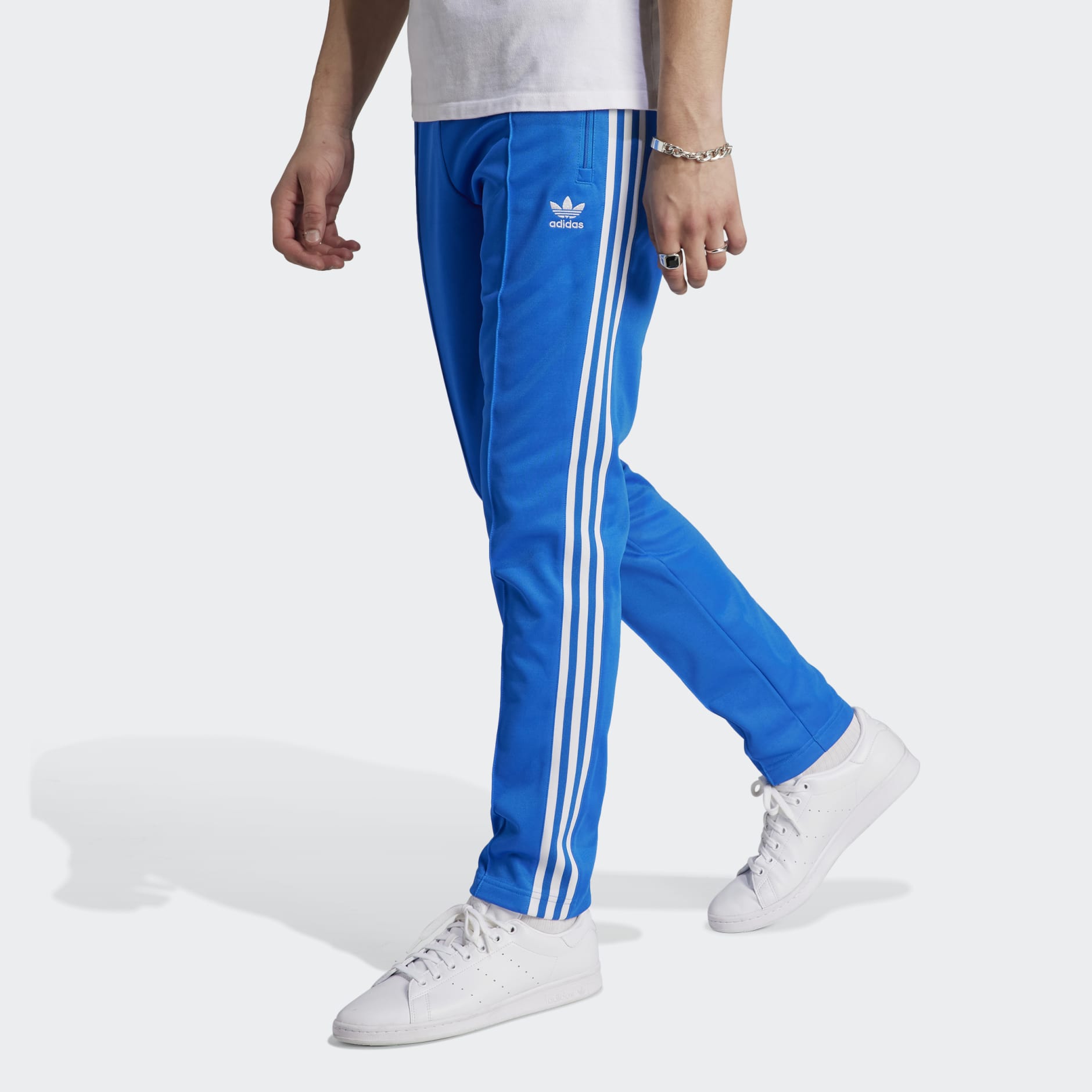 Women's Clothing - Firebird Loose Track Pants - Blue | adidas Oman
