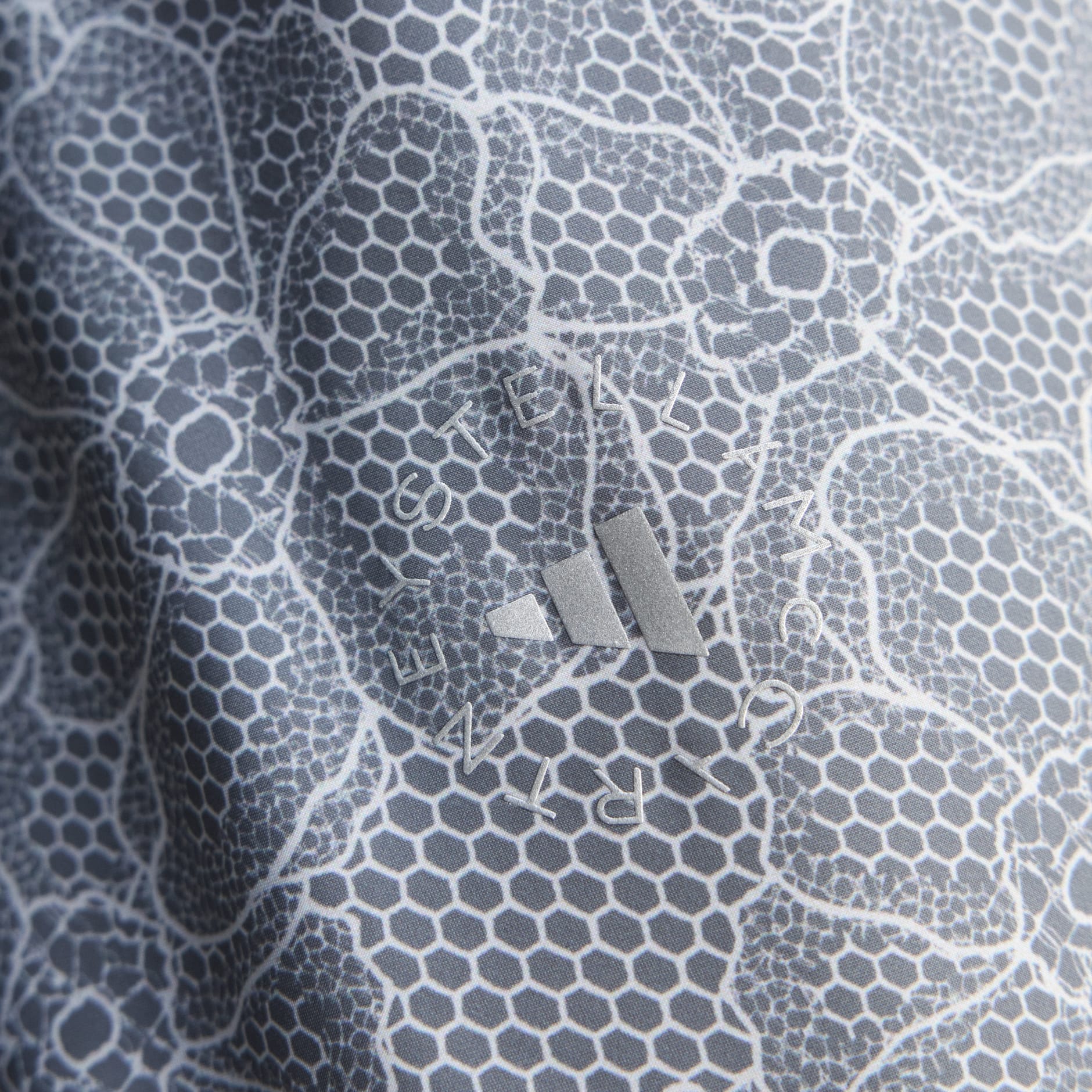 Jachetă de alergare adidas by Stella McCartney cu imprimeu