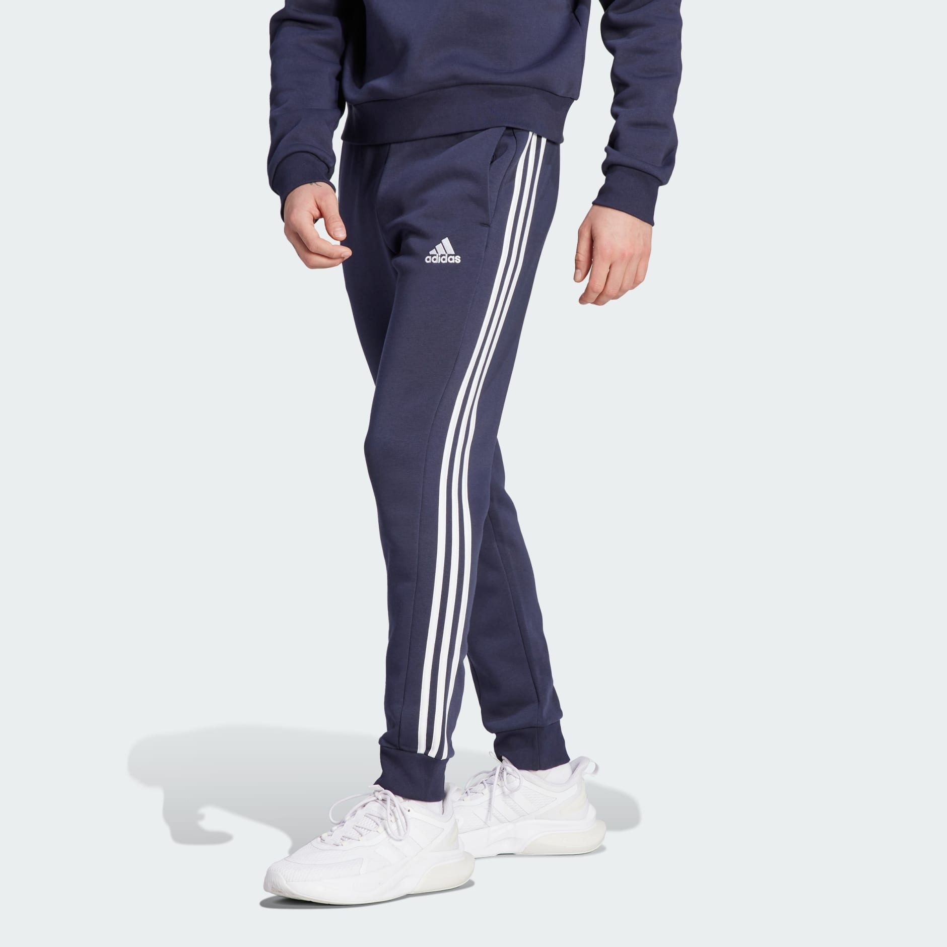 adidas Essentials Fleece 3-Stripes Tapered Cuff Pants - Blue | adidas UAE