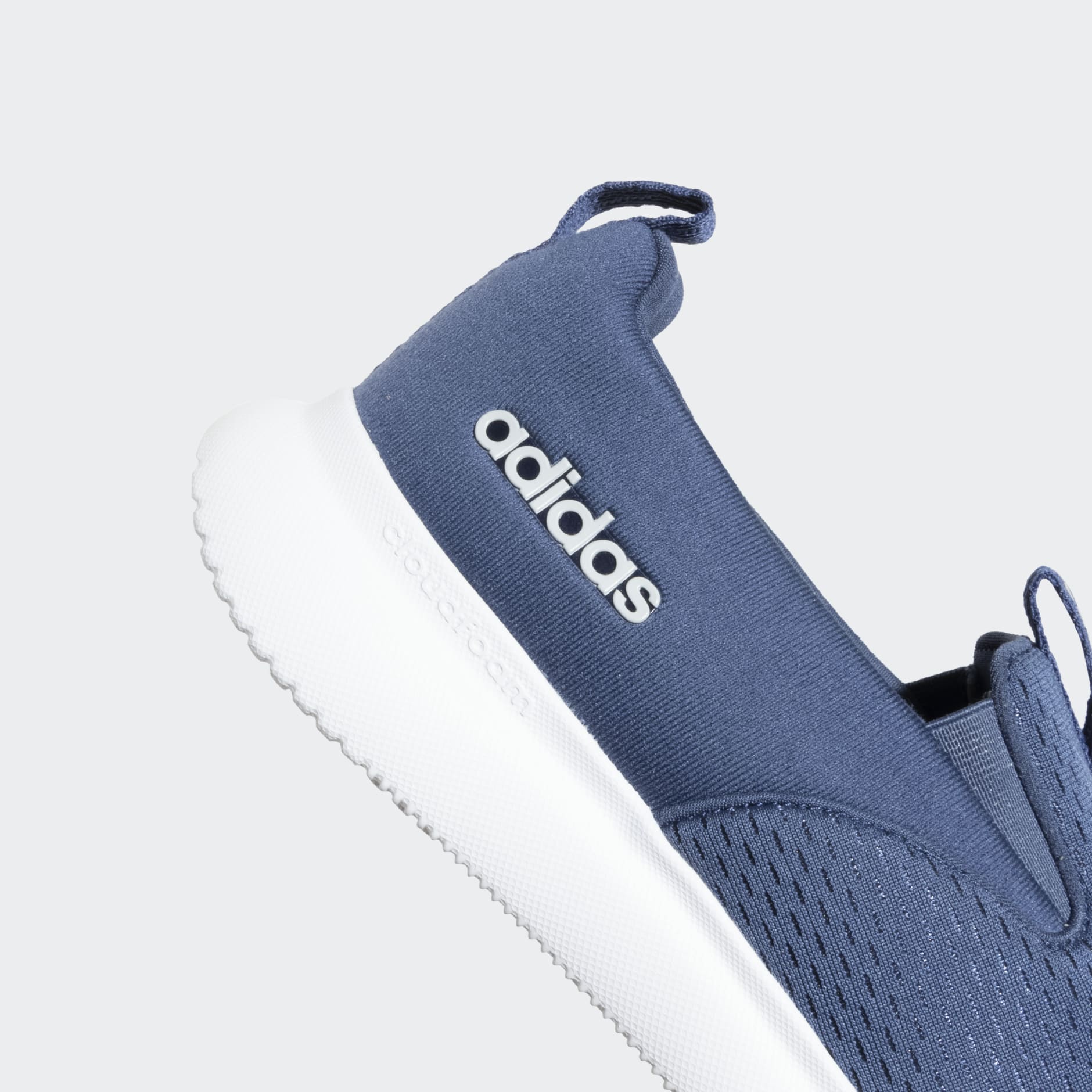 Adidas slip on blu best sale