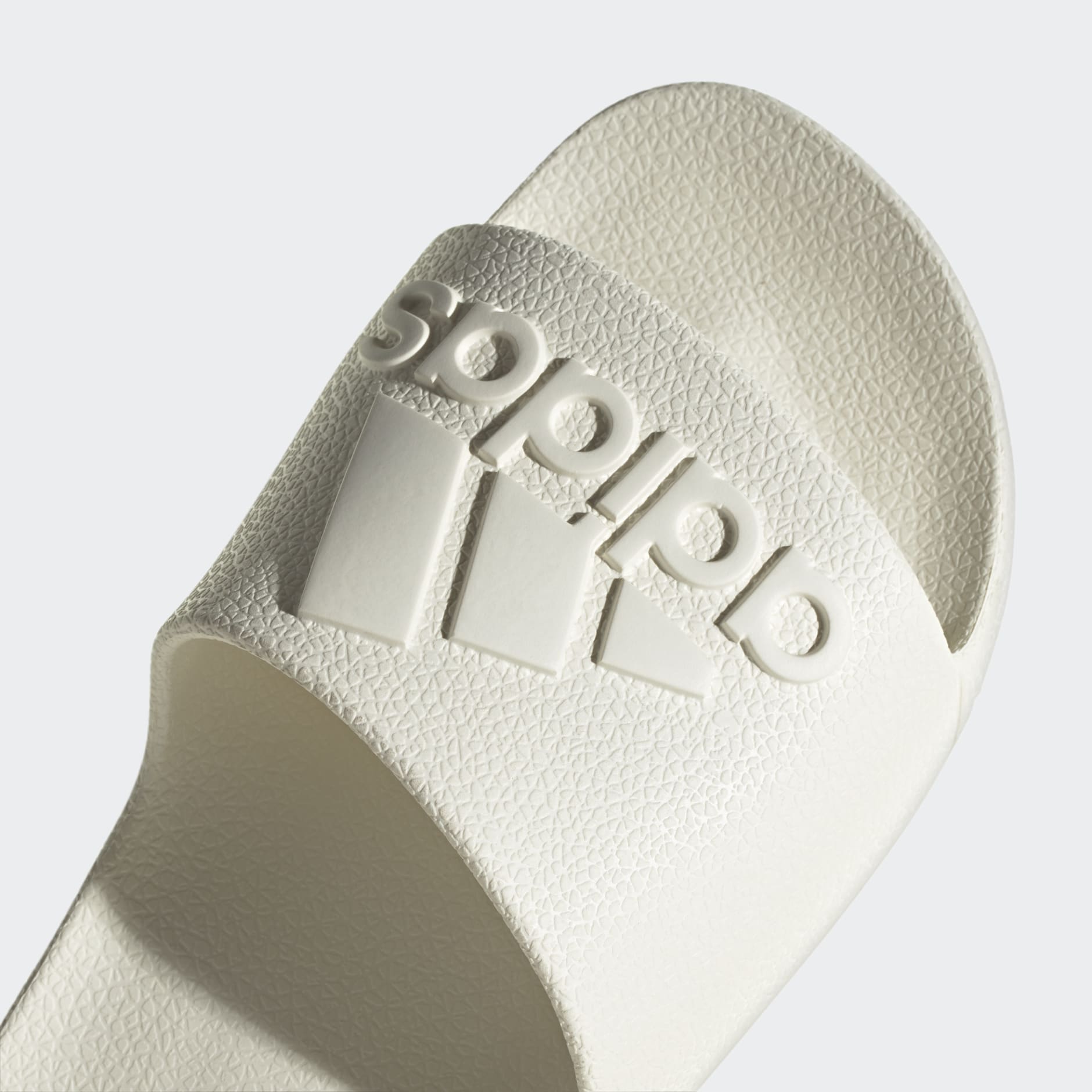 Adidas adilette best sale aqua slides white