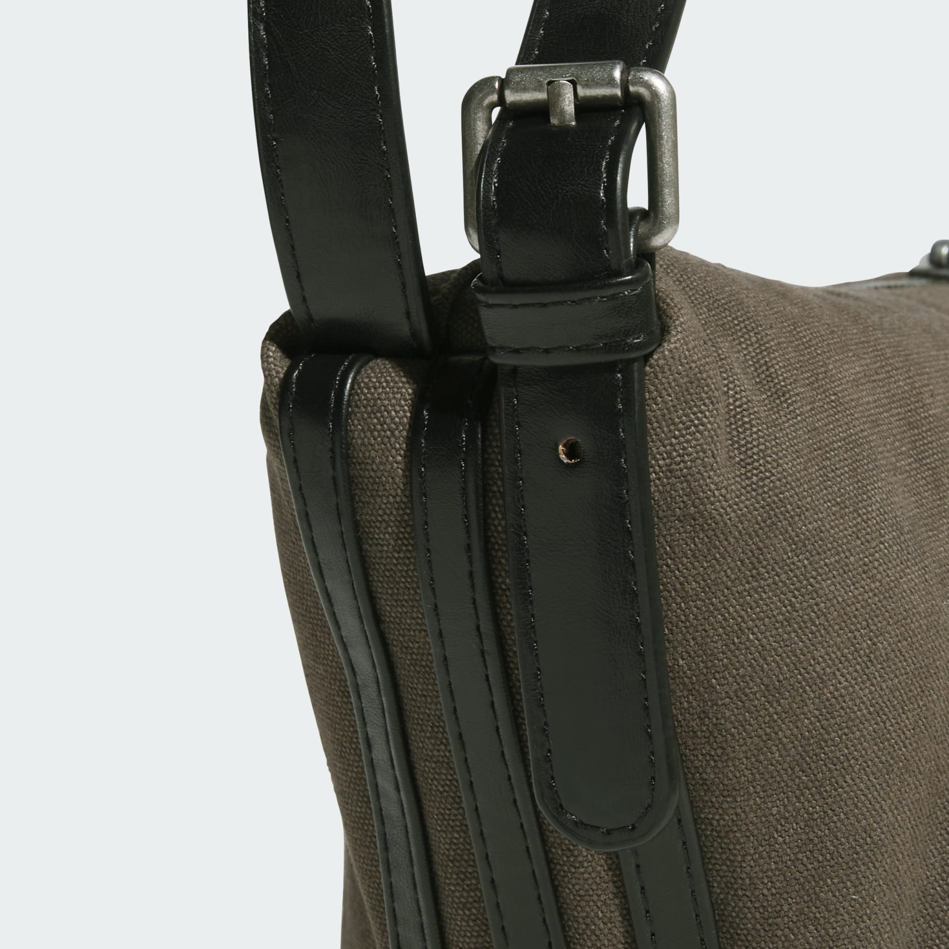 女裝扣帶斜孭袋配棉