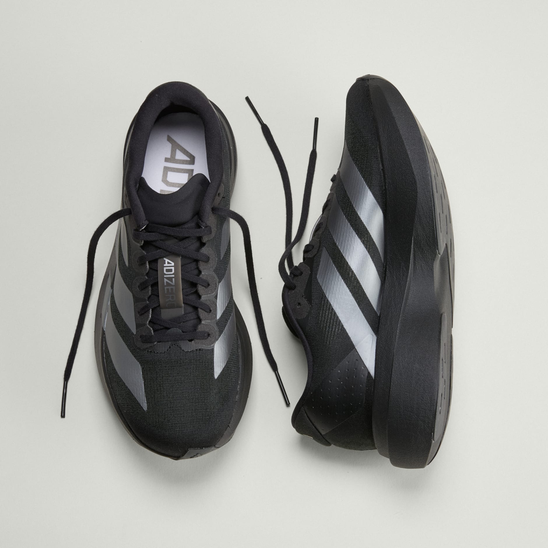 SHOES - Adizero EVO SL Shoes - Black | adidas Oman