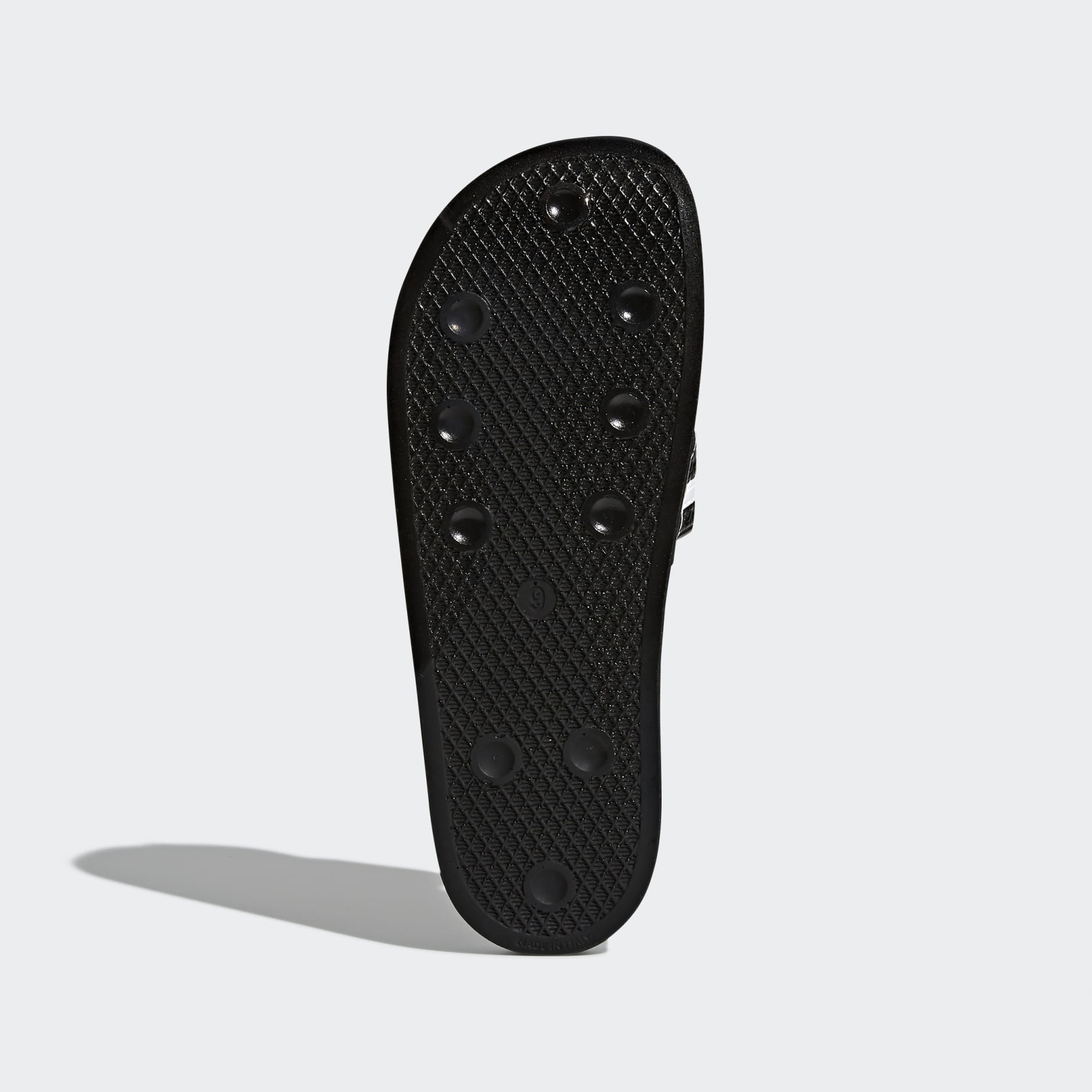 Adidas originals adilette sliders discount in black with polka dots