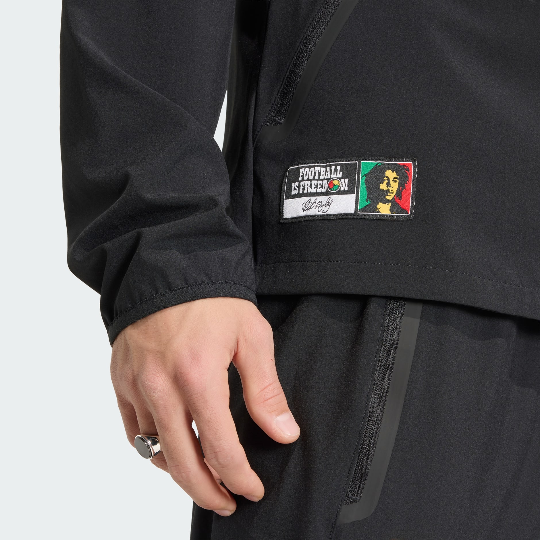 Jachetă de v&acirc;nt Jamaica Tiro Travel cu fermoar de sus p&acirc;nă jos