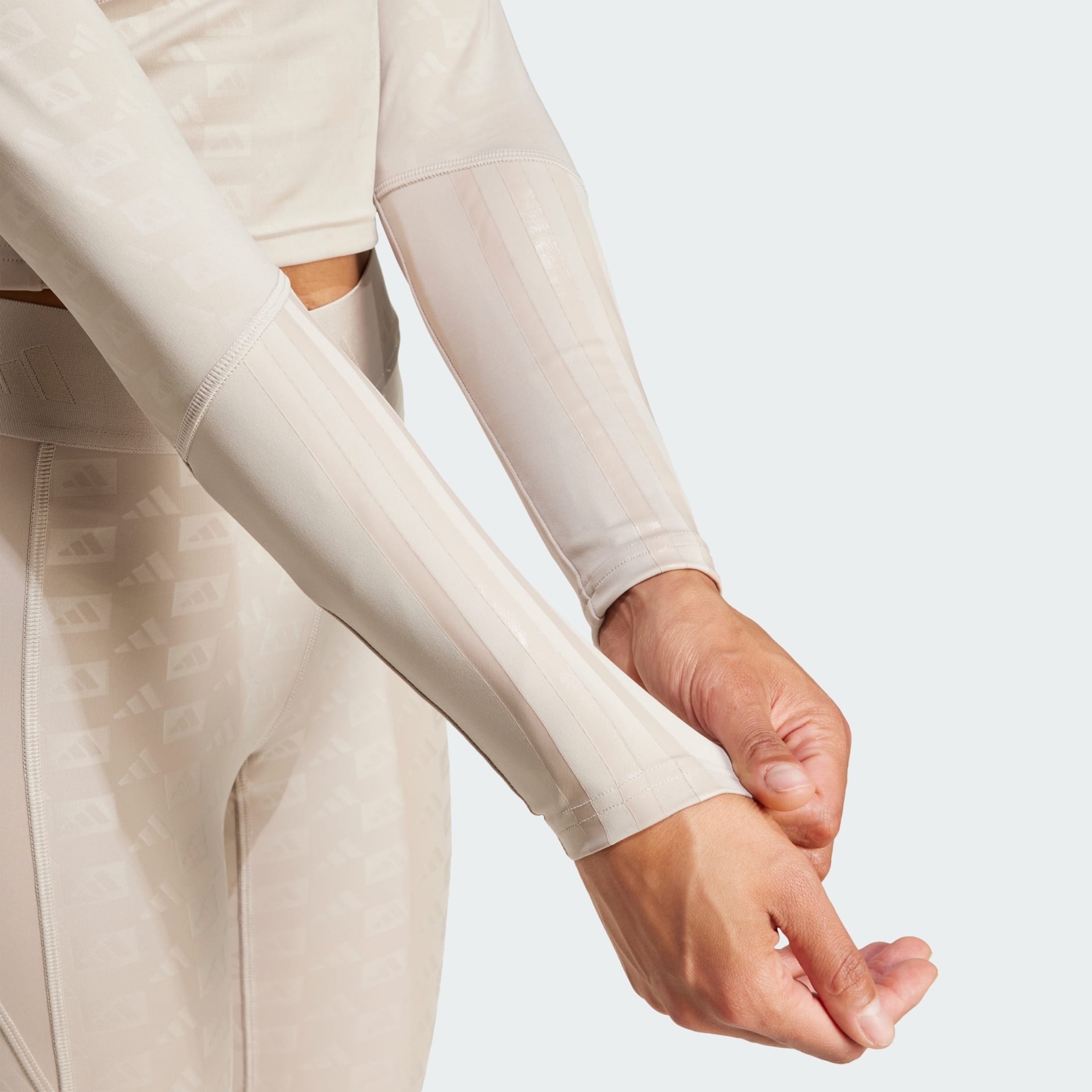 CLOTHING - Hyperglam Training Emboss Top - Beige | adidas Oman