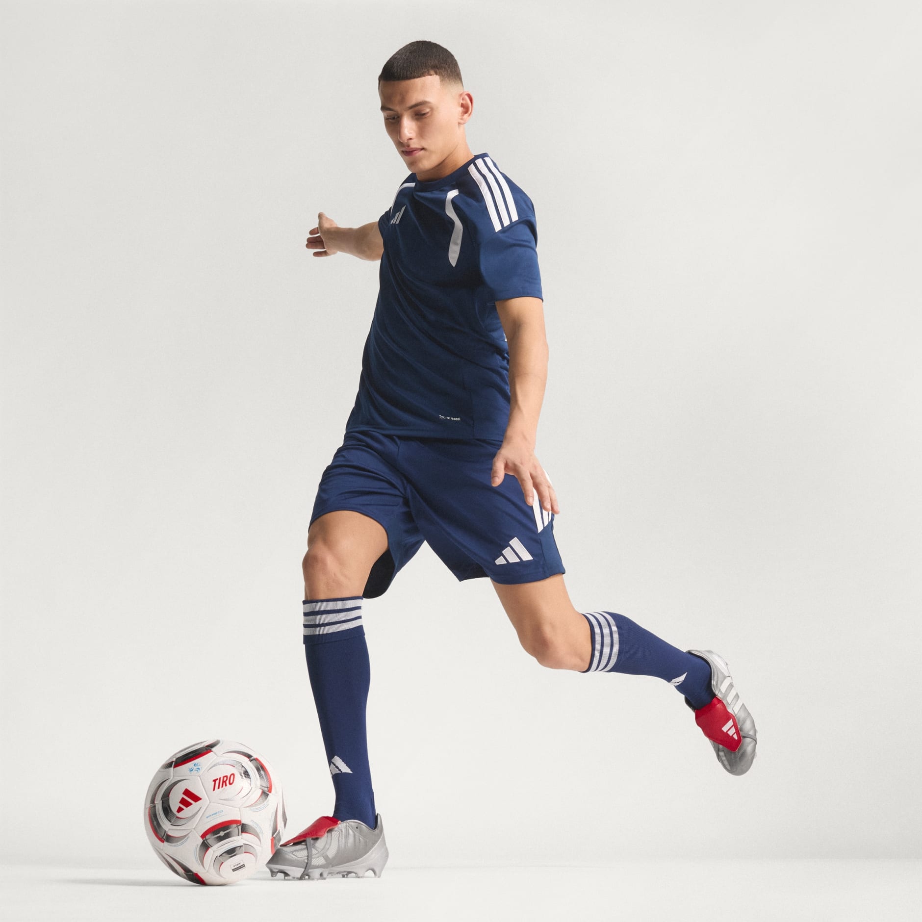 PREDATOR MANIA Firm Ground Football Boots