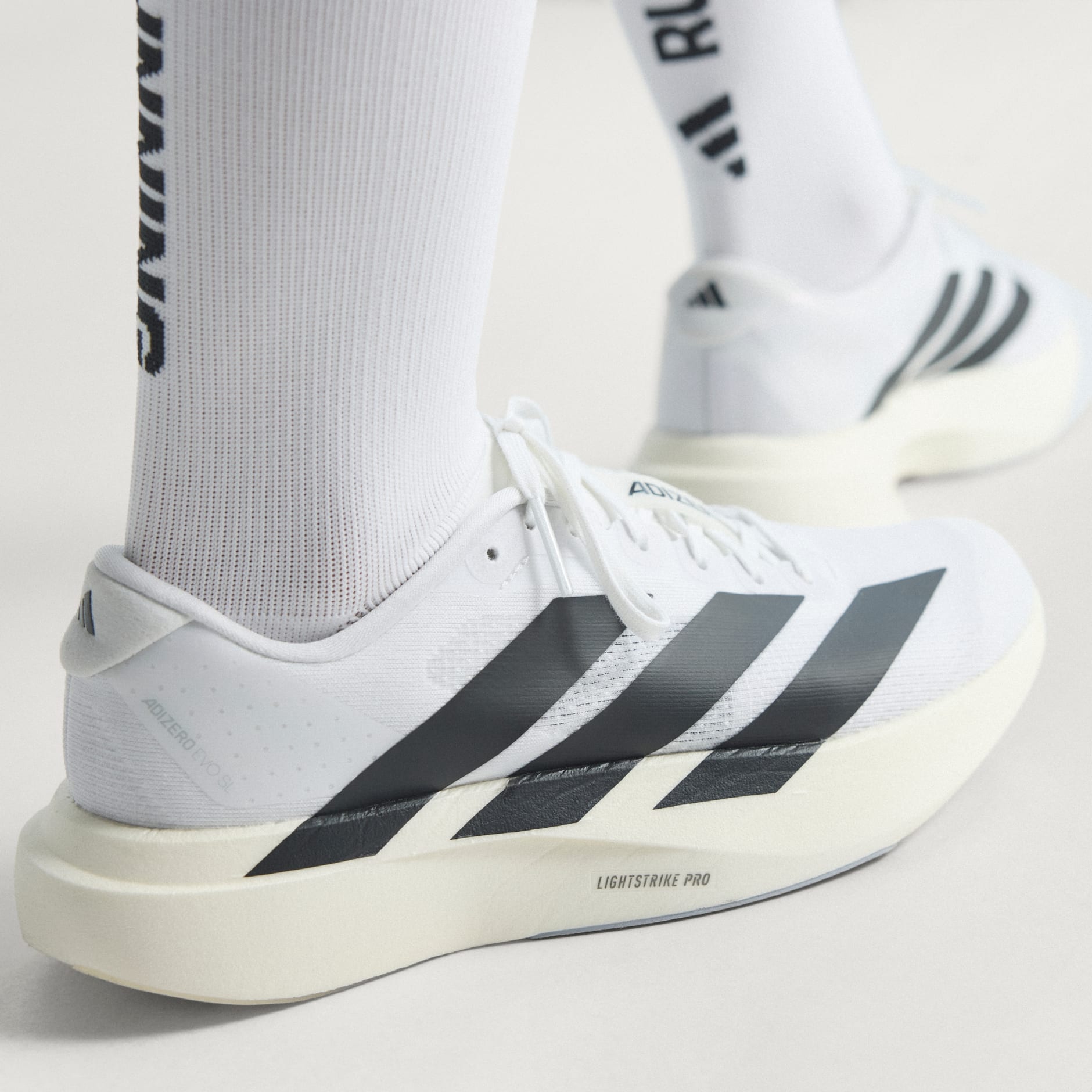Shoes - Adizero EVO SL Shoes - White | adidas South Africa