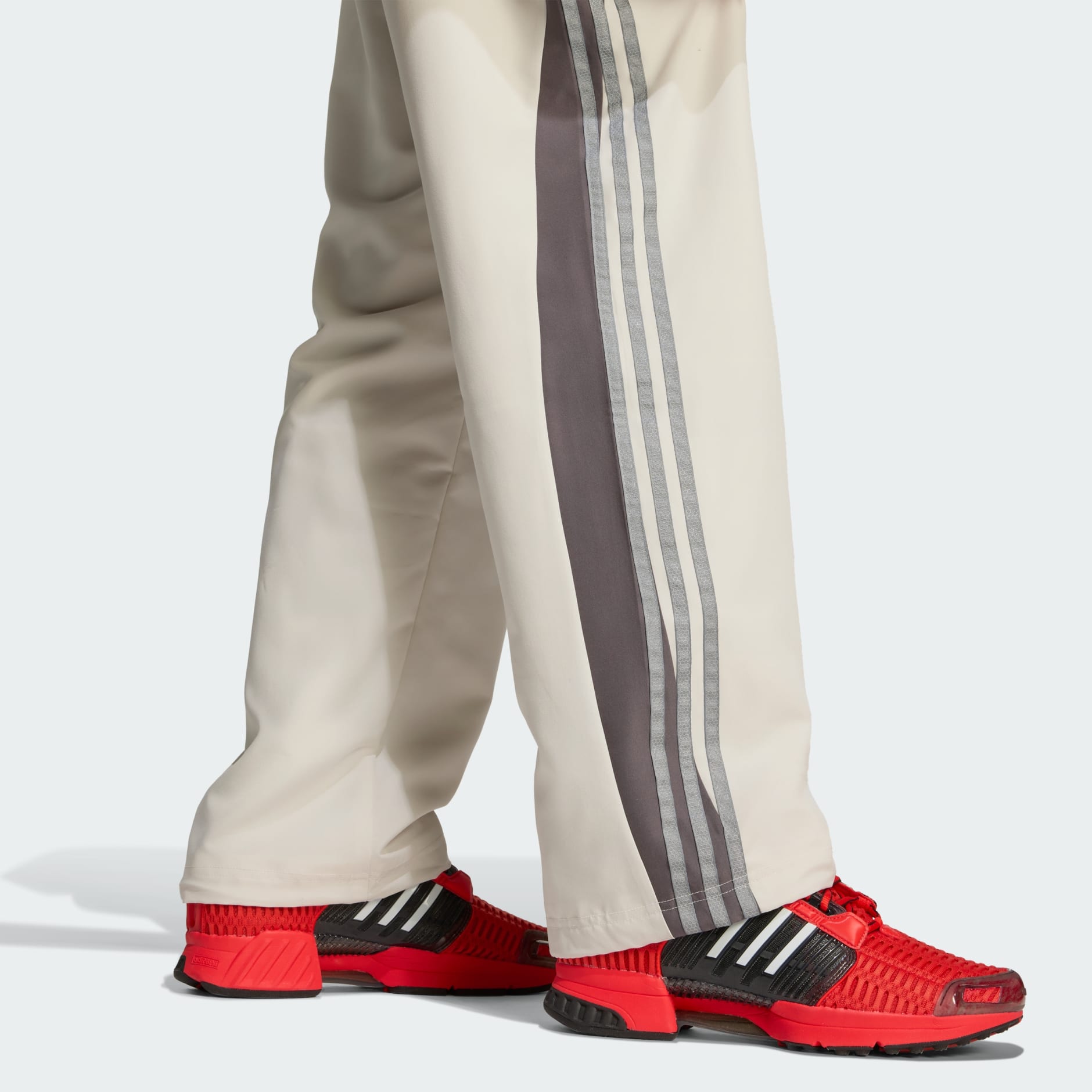 LOOSE CUTLINE TRACK PANTS