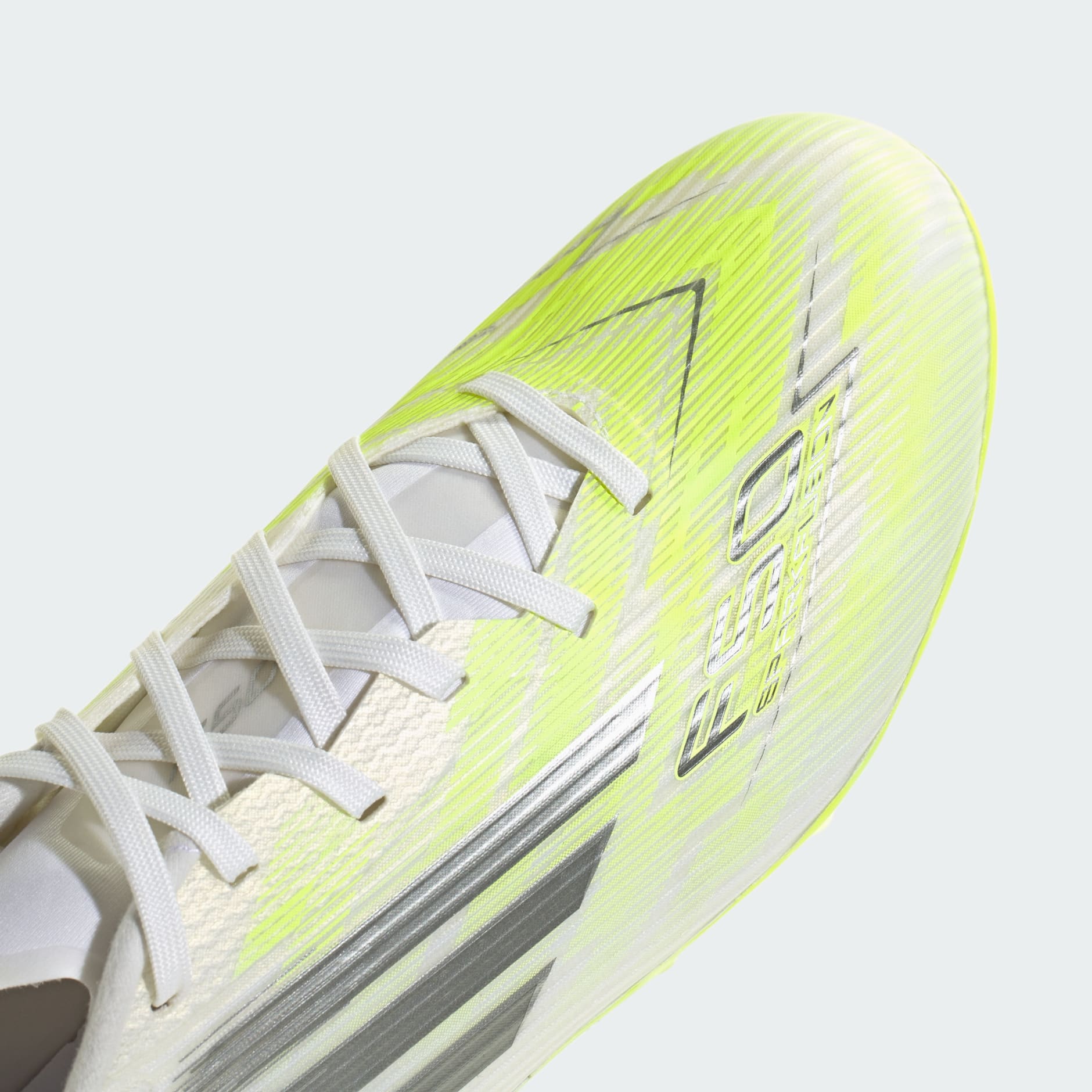 Ženske nogometne kopačke F50 SPARKFUSION LEAGUE za tvrdu / umjetnu podlogu