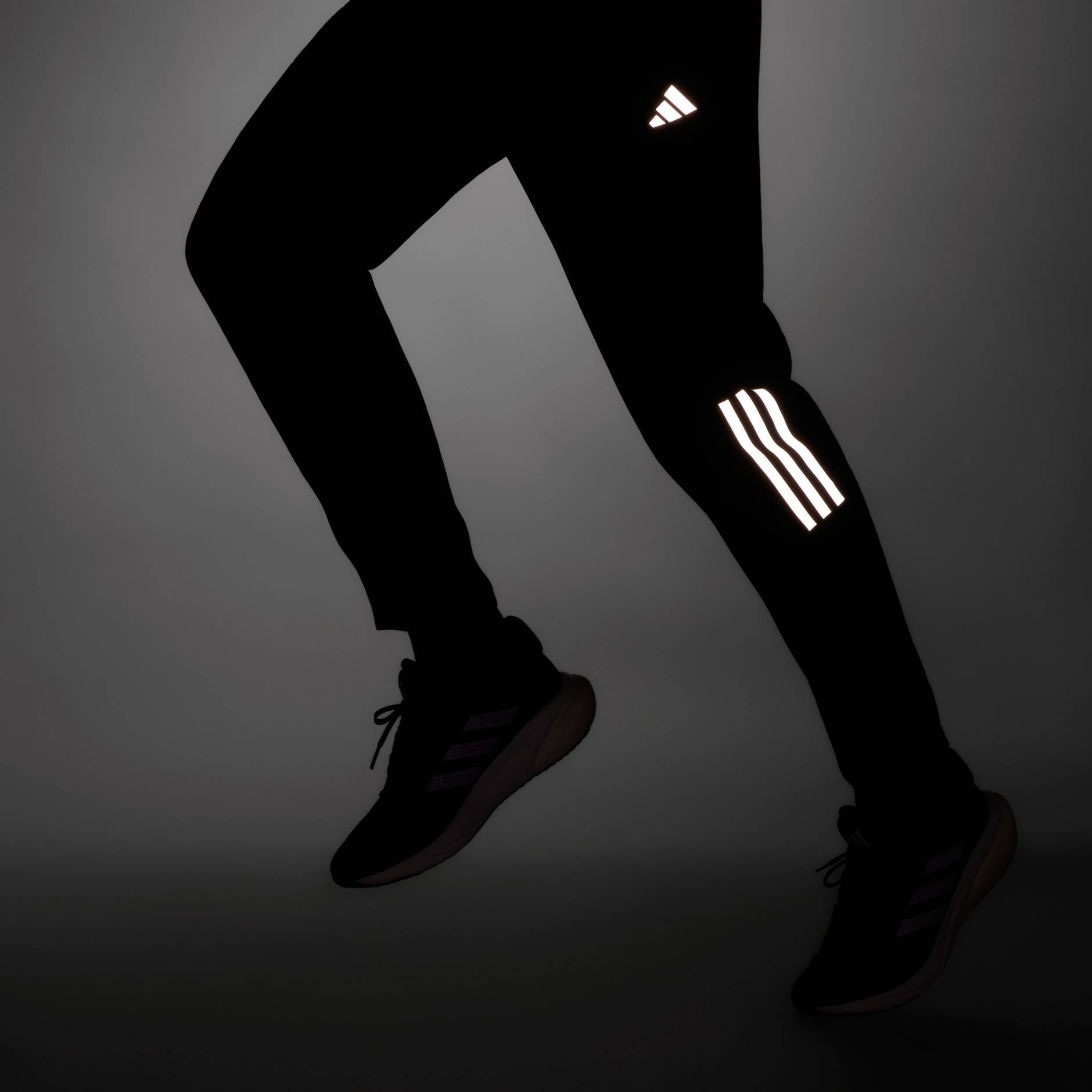 adidas Own the Run Woven Astro Pants - Black | adidas UAE