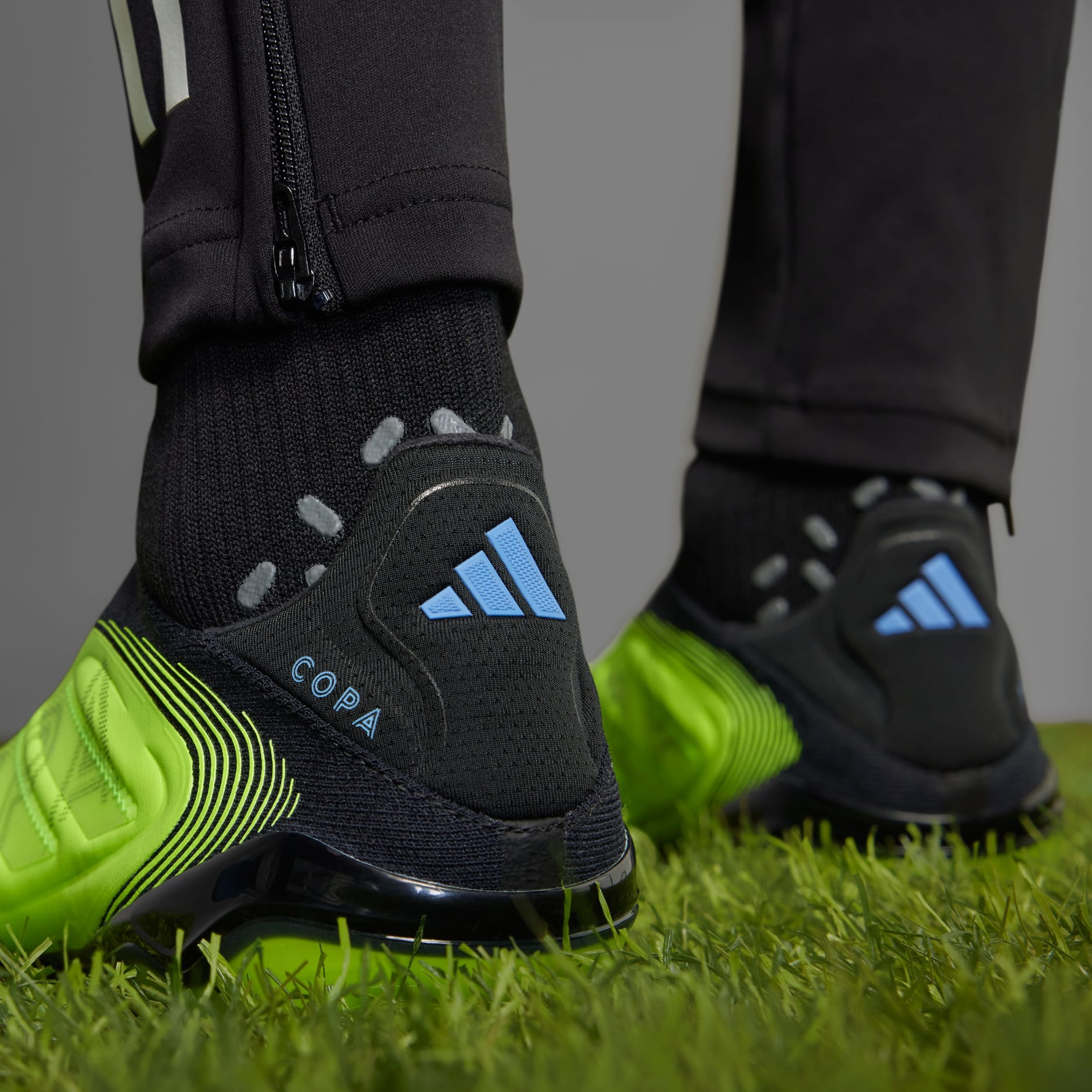 Ghete de fotbal Copa Pure 3 Elite fără șireturi pentru teren ferm