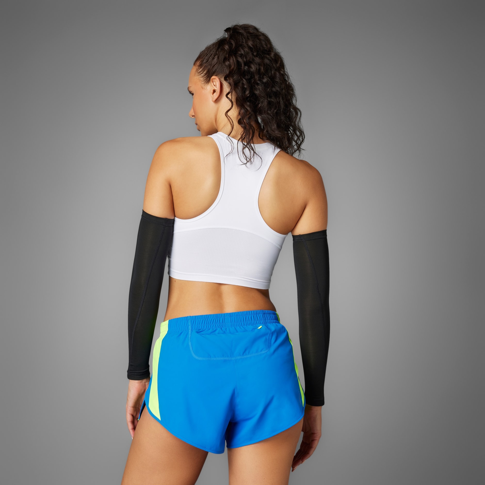 CLOTHING - Adizero Retro Running Crop Top - White | adidas Oman