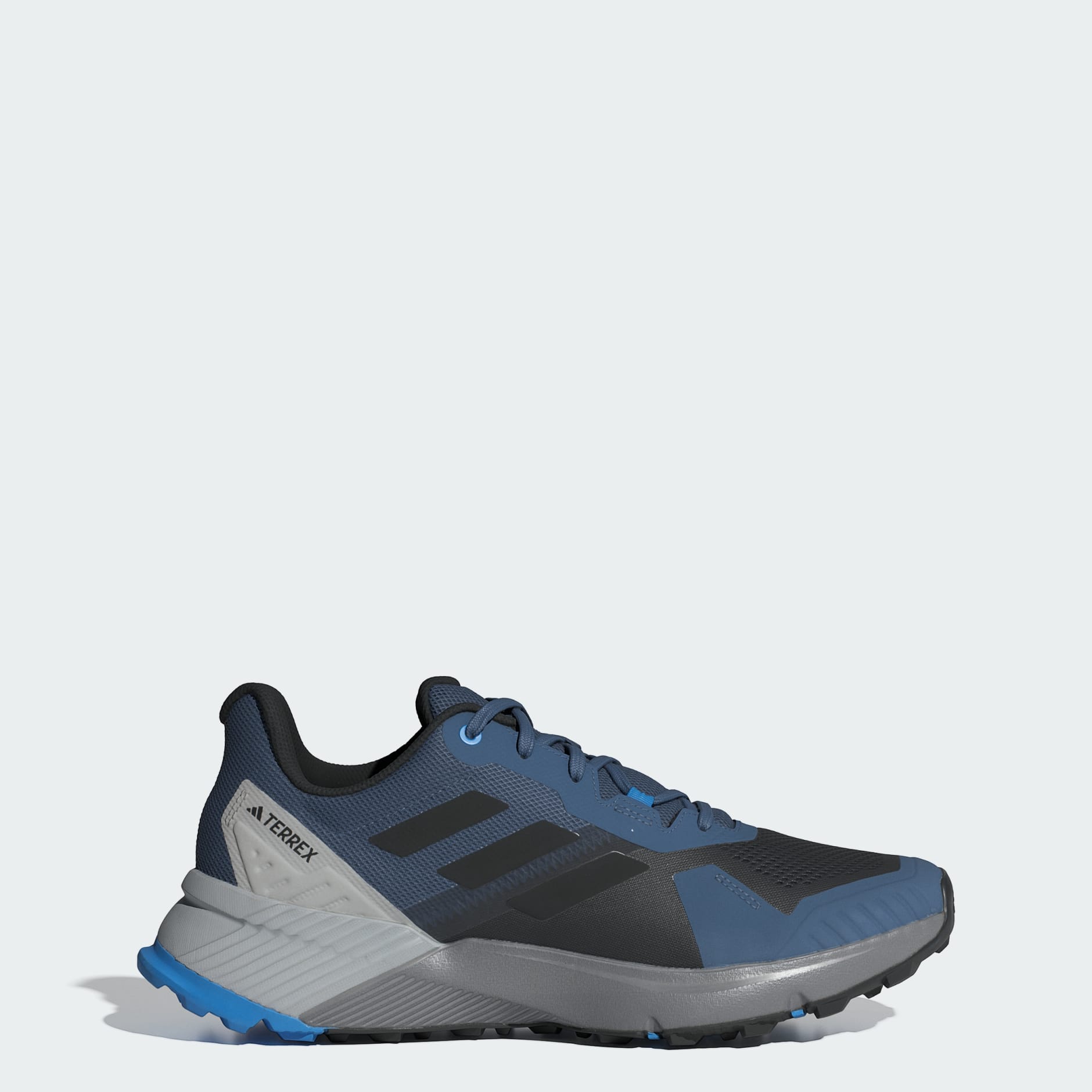 Adidas traxion black and blue on sale