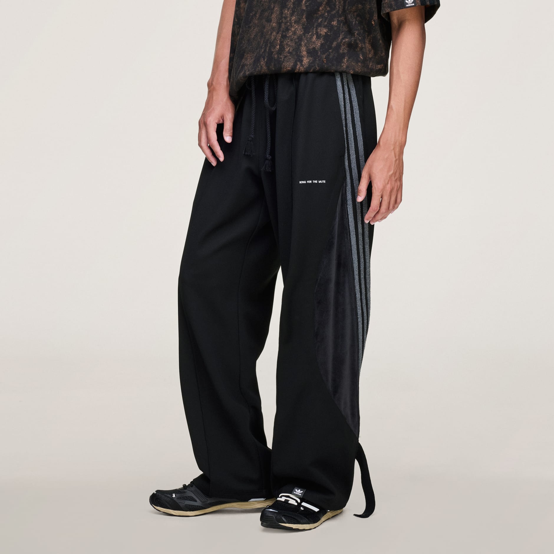 Clothing - SONG FOR THE MUTE ADI006 TRACK PANT - Black | adidas Oman