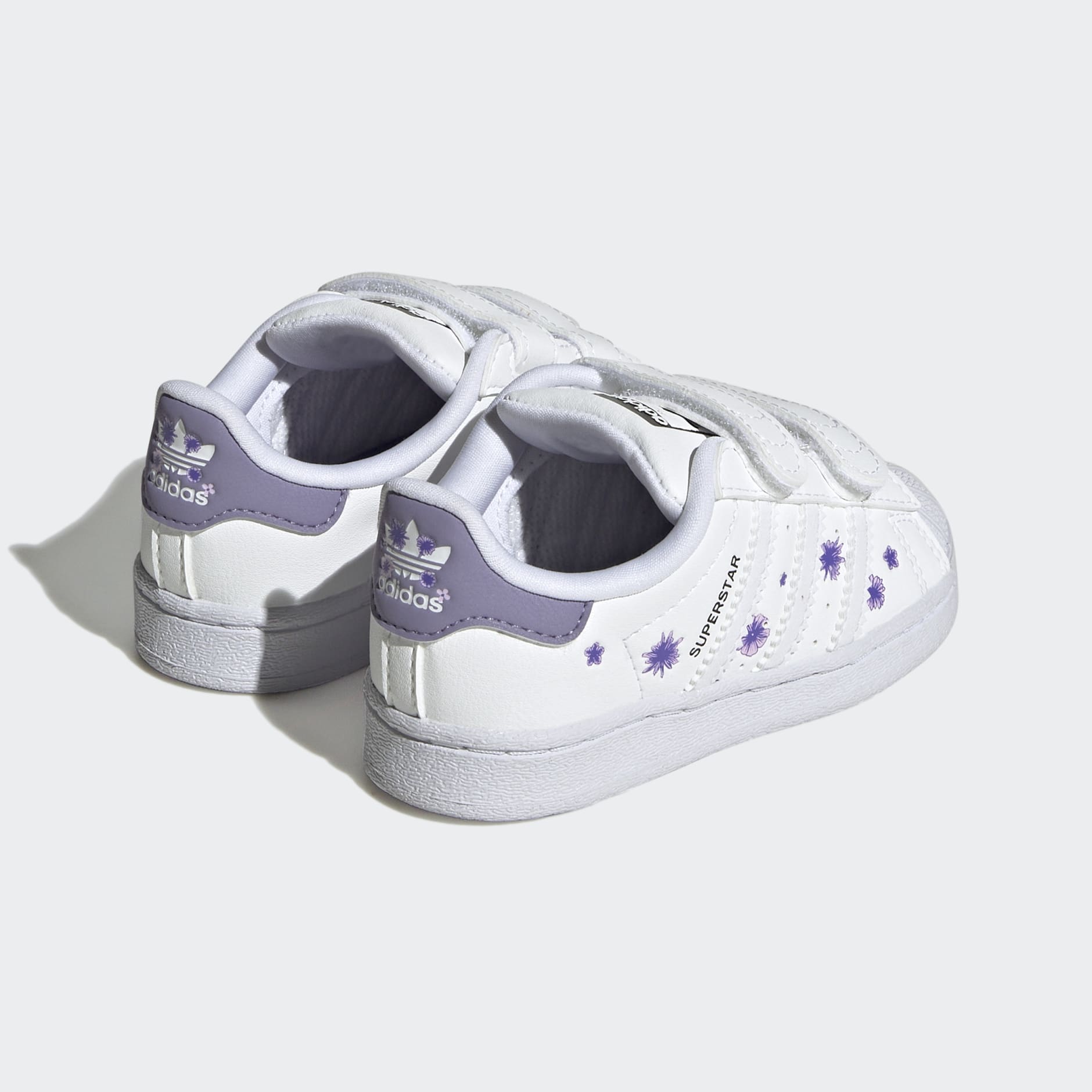 Purple and deals white adidas sneakers