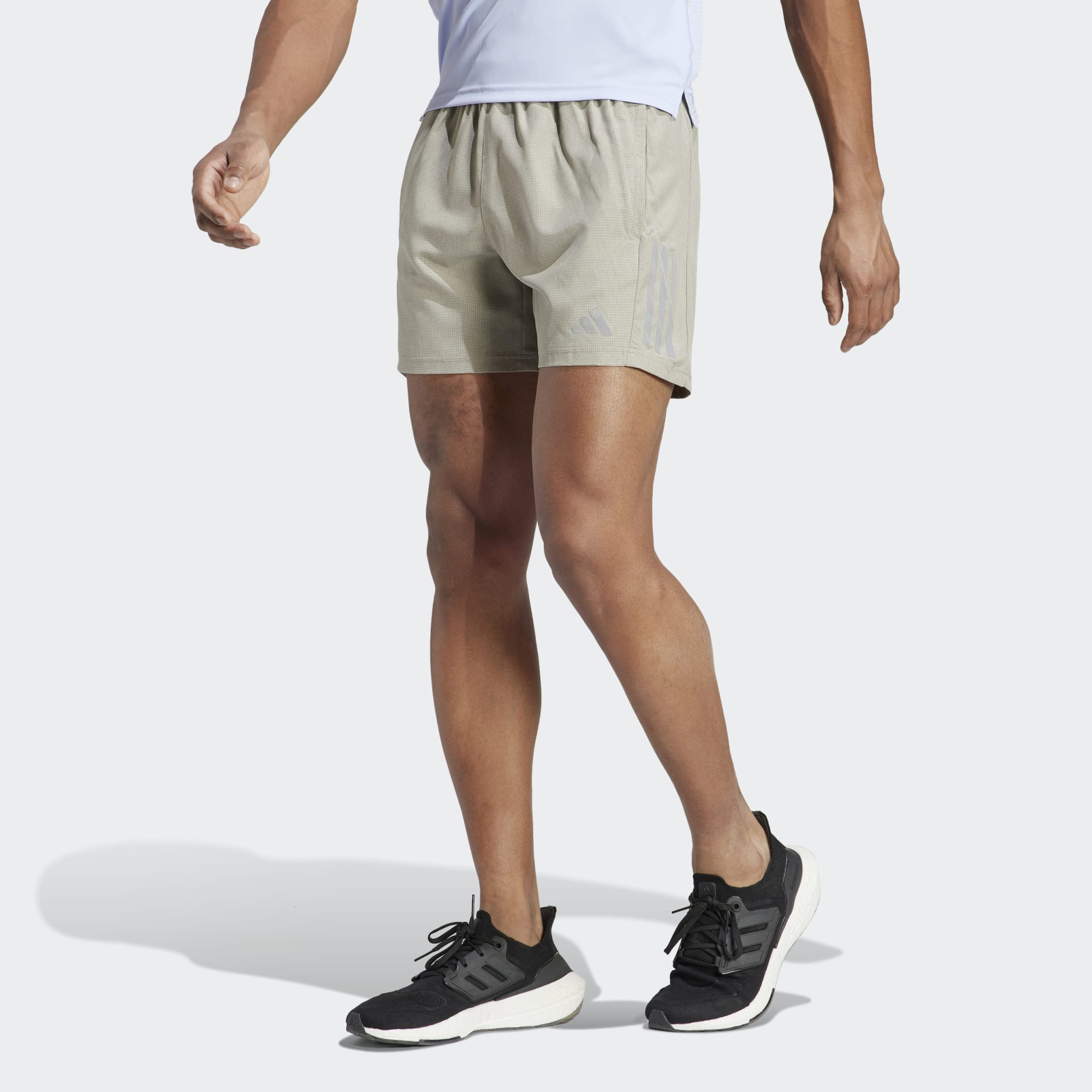 Clothing - Own the Run Heather Shorts - Green | adidas South Africa