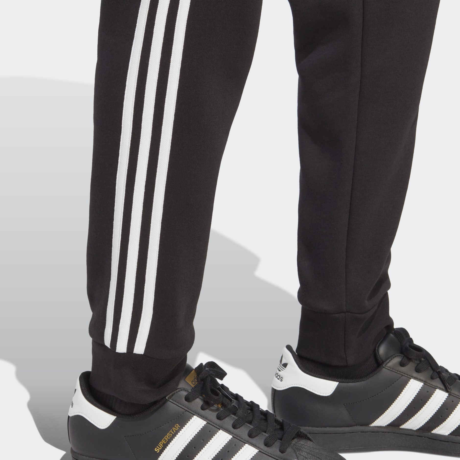 Adidas originals - adicolor - pantalon de survêtement à trois bandes - noir sale