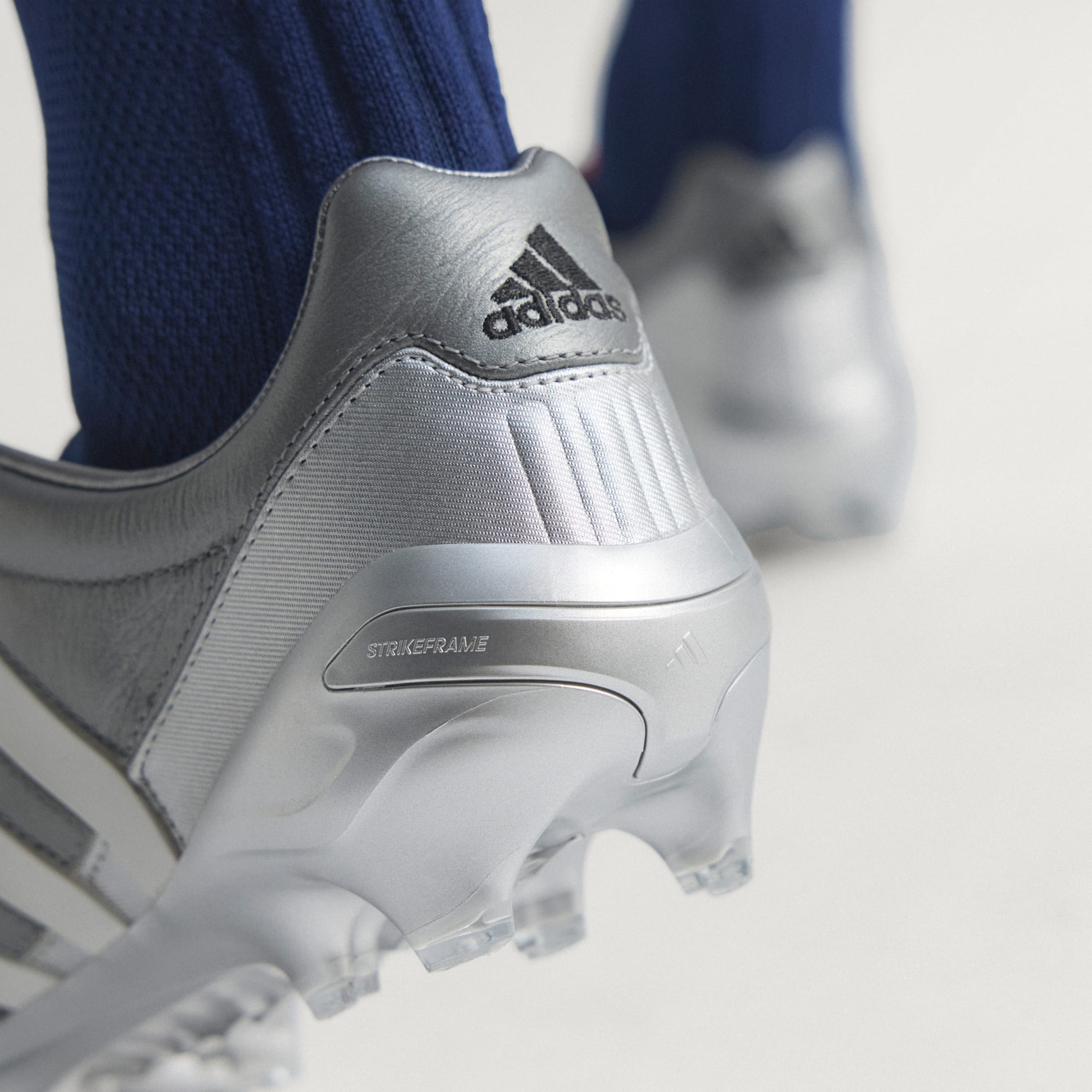 PREDATOR MANIA Firm Ground Football Boots