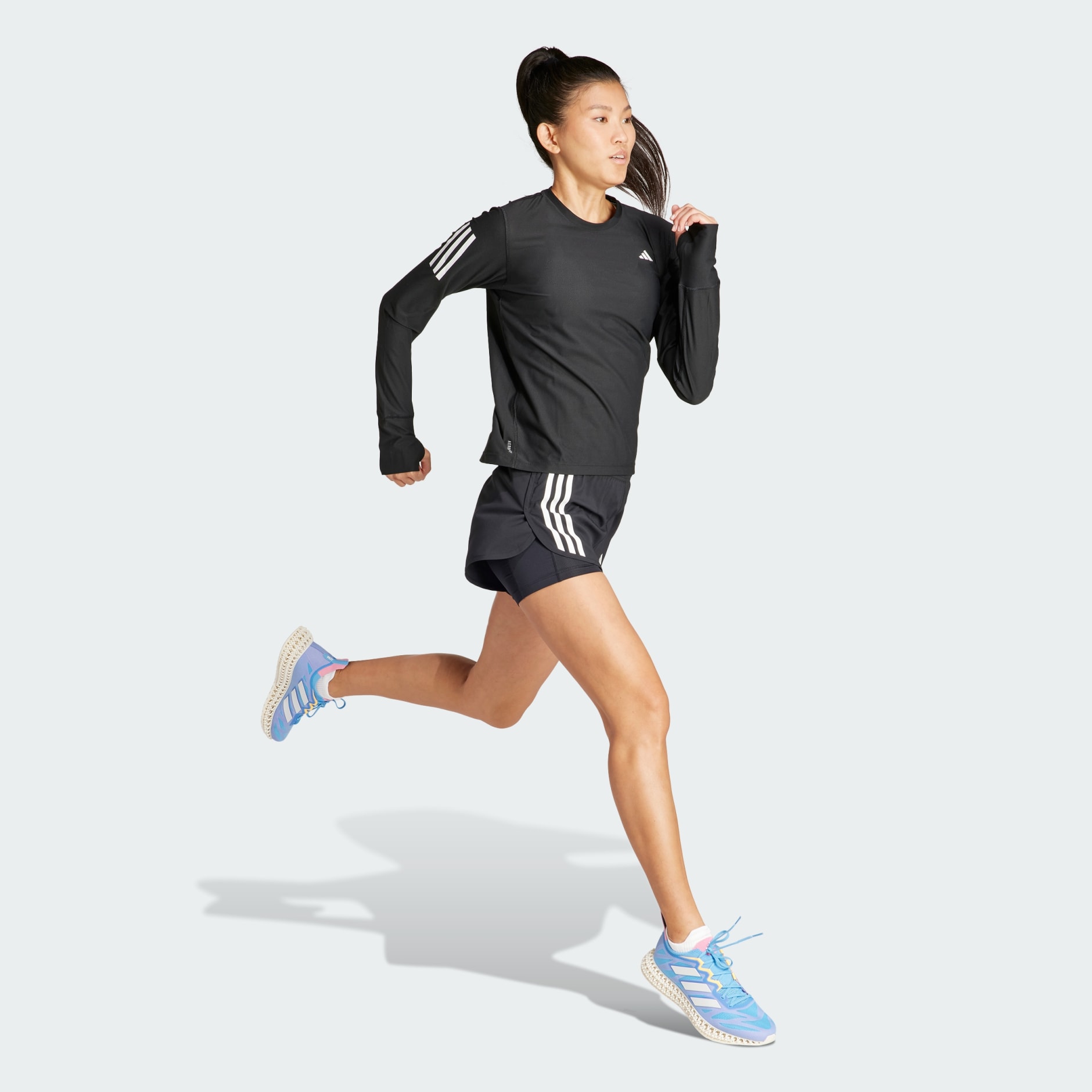 Women s Clothing Own The Run Long Sleeve Tee Black adidas Saudi Arabia