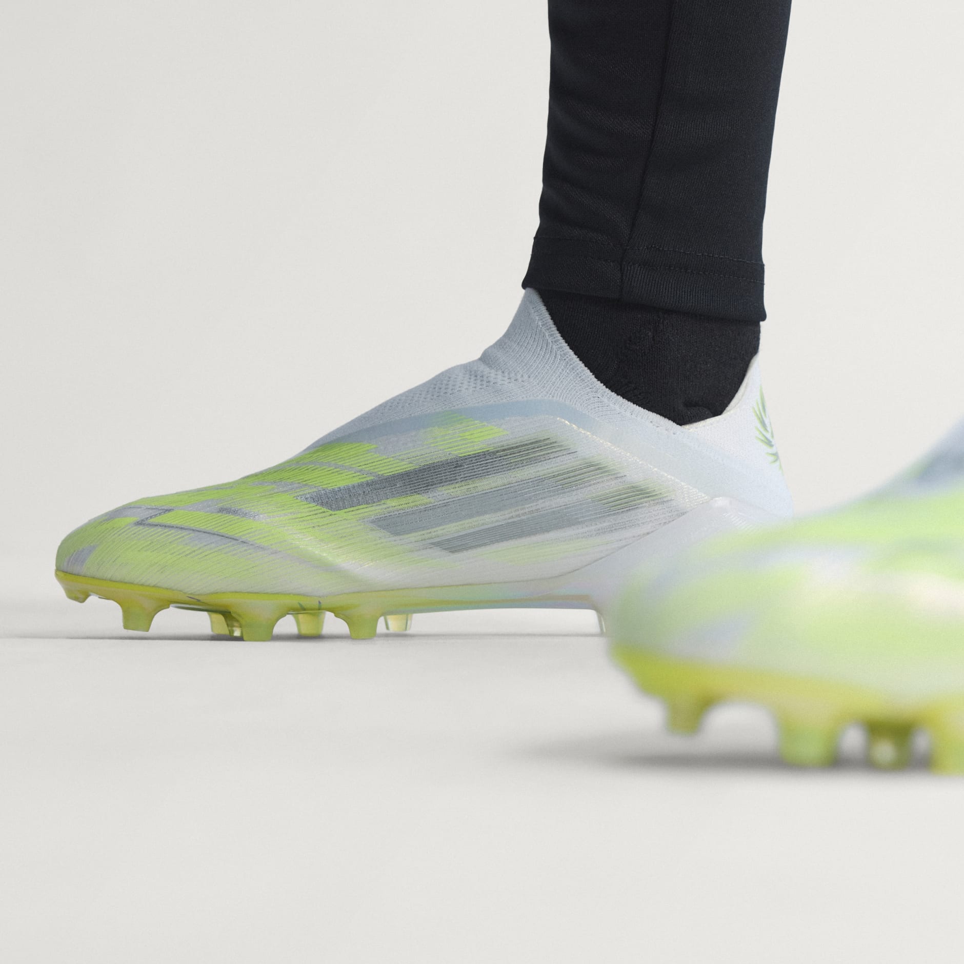 Ghetele de fotbal pentru femei F50 SPARKFUSION ELITE fără șireturi, pentru teren dur / artificial