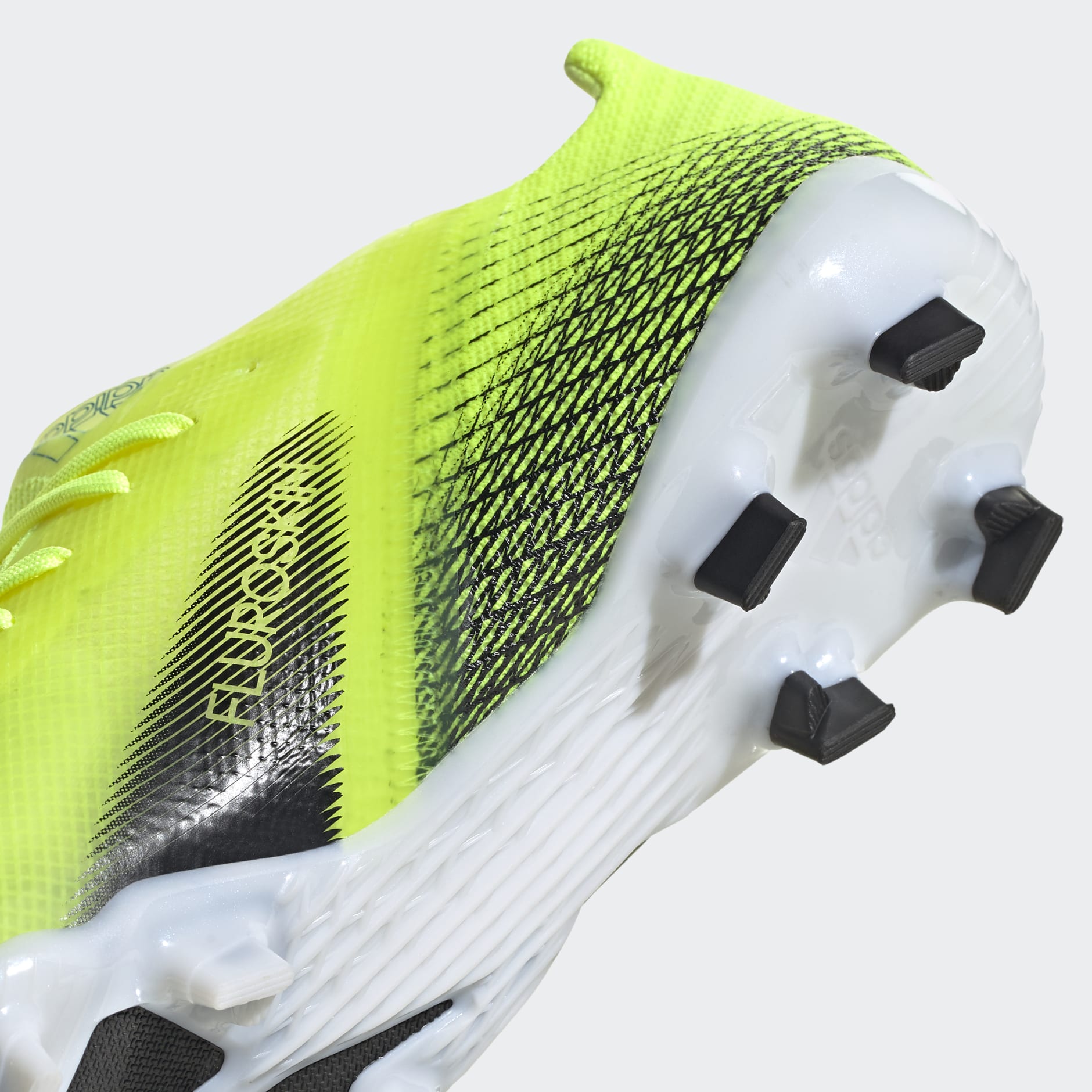 X Ghosted.1 Firm Ground Boots