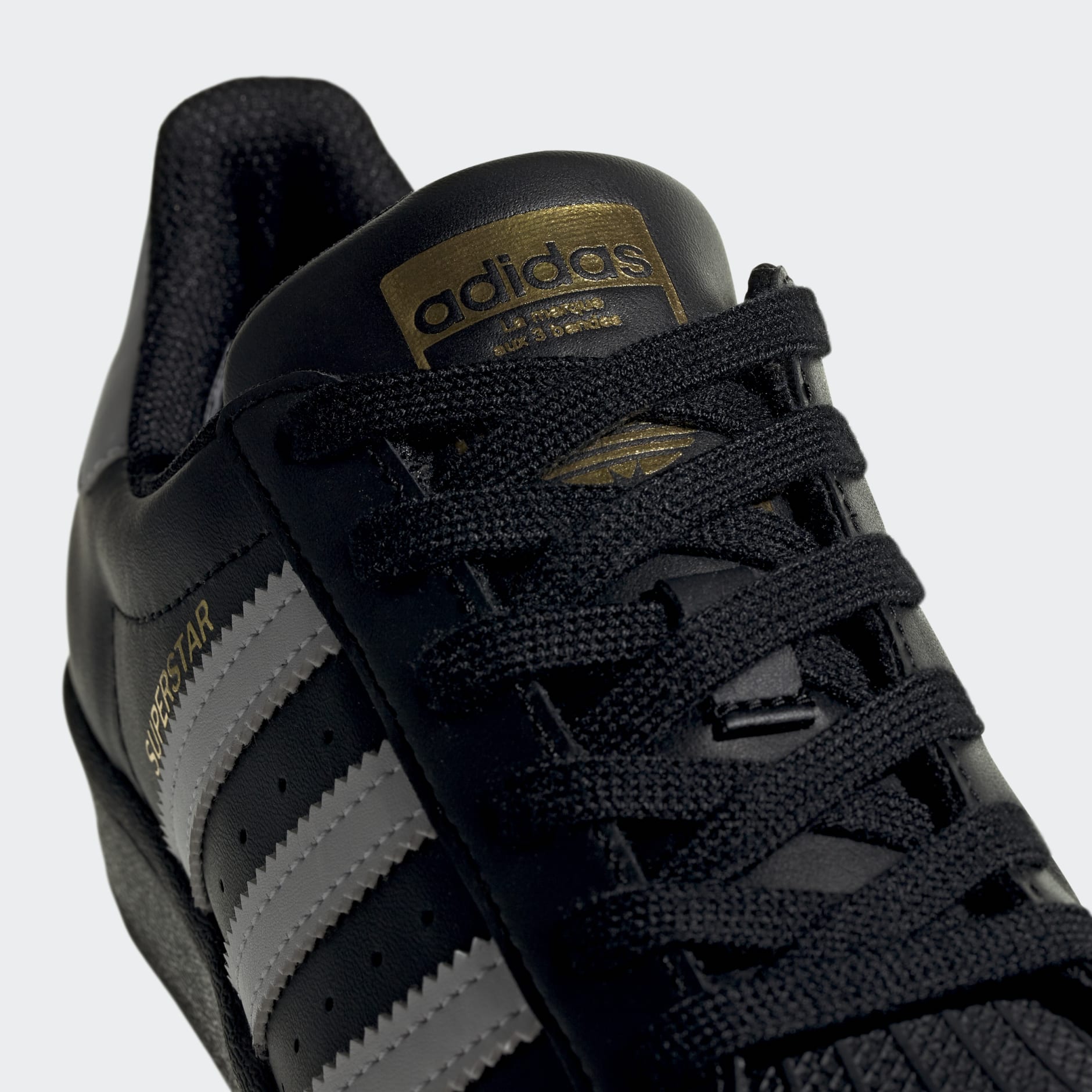 Adidas superstar black boys best sale