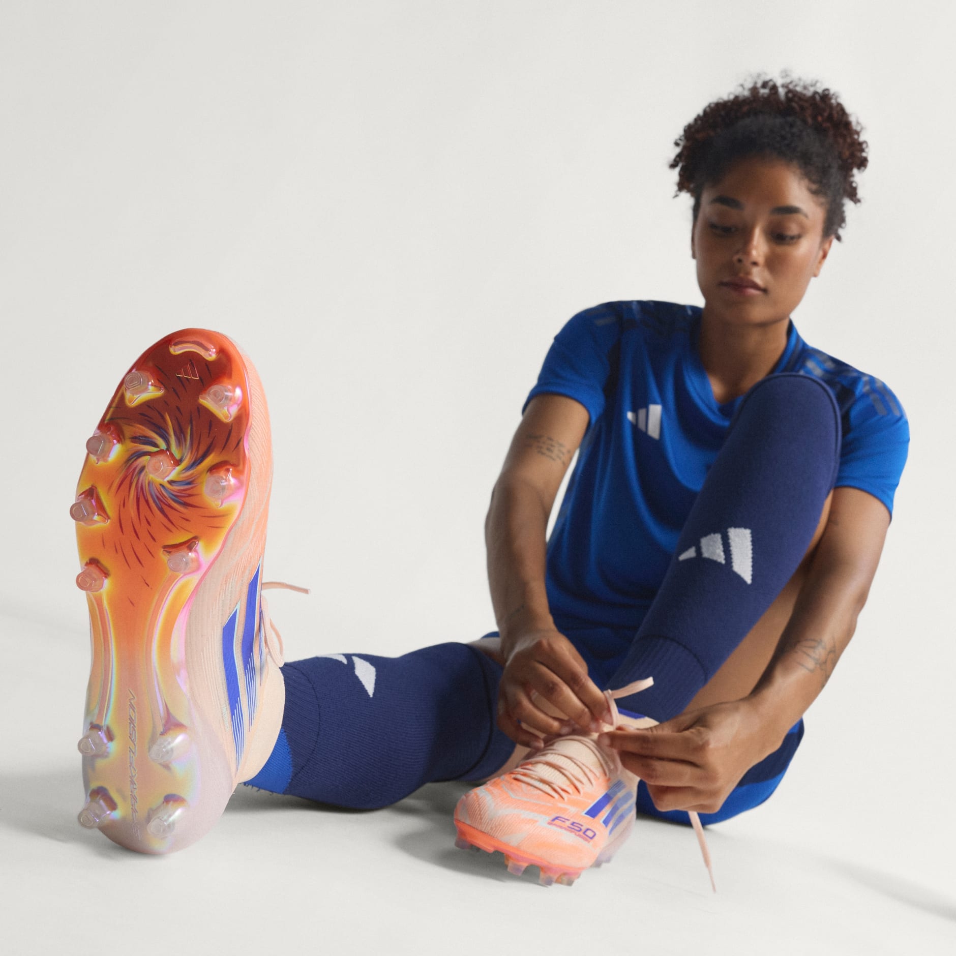 SHOES - F50 Sparkfusion Elite Mid Firm Ground/Artificial Grass