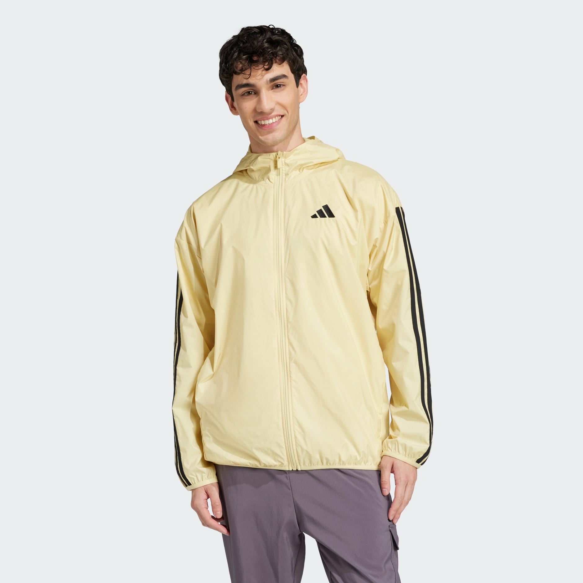 Clothing - Essentials 3-Stripes Windbreaker - Yellow | adidas Oman