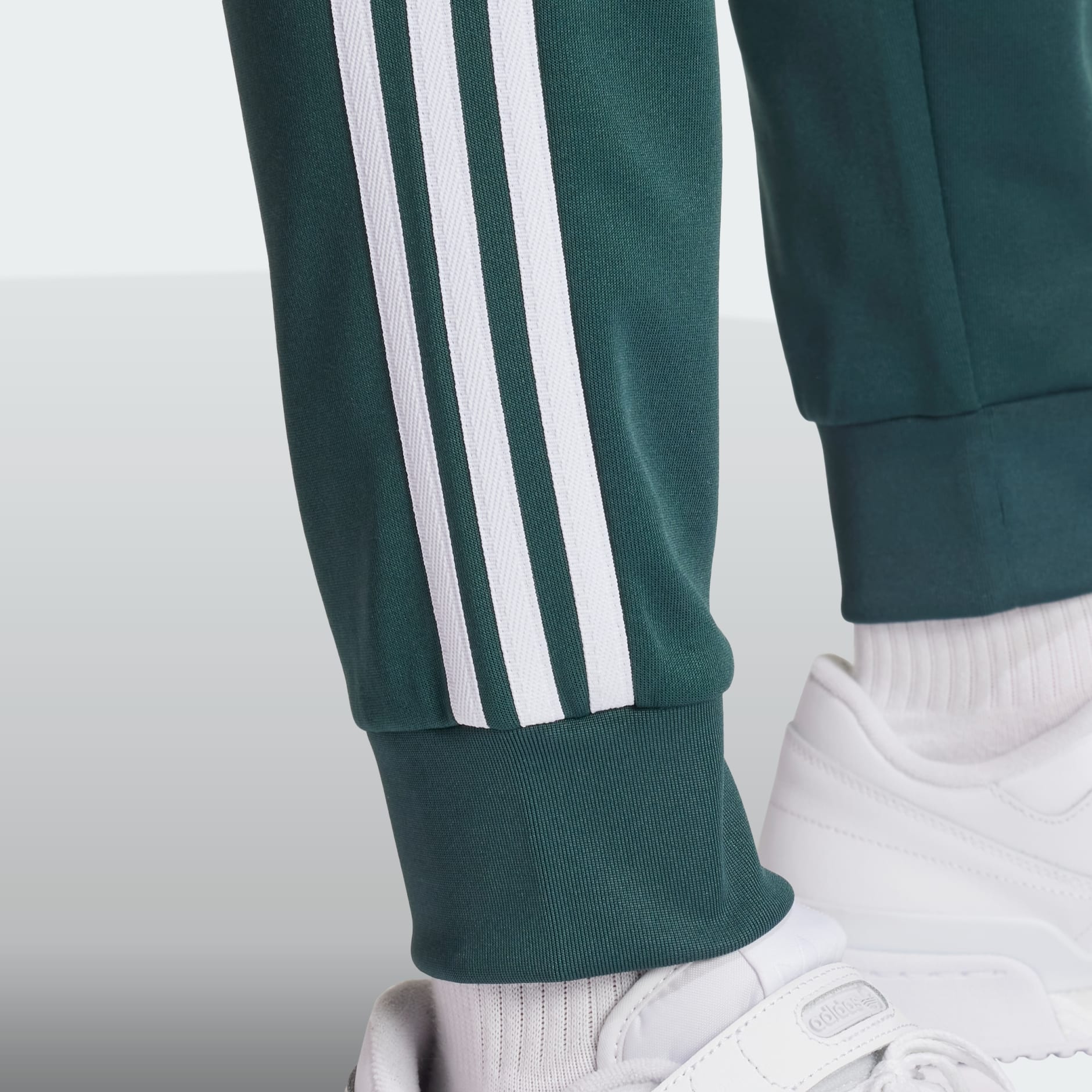 Adidas sst cuffed track pants online