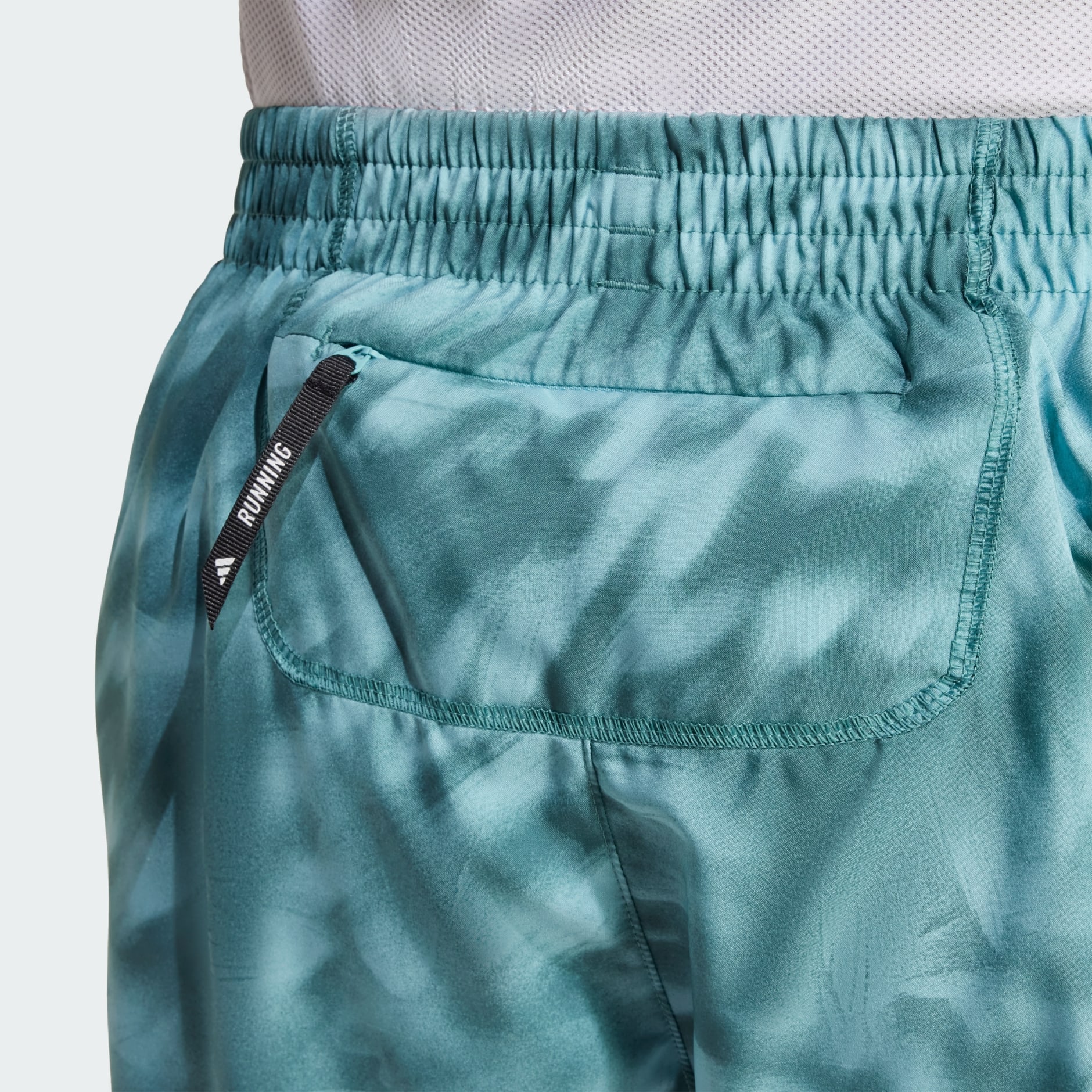 Own The Run Allover Print Shorts