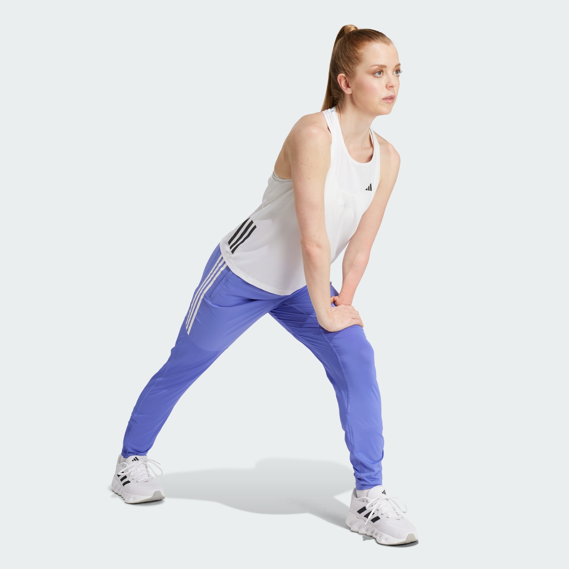 CLOTHING - Own the Run 3-Stripes Pants - Blue | adidas Oman