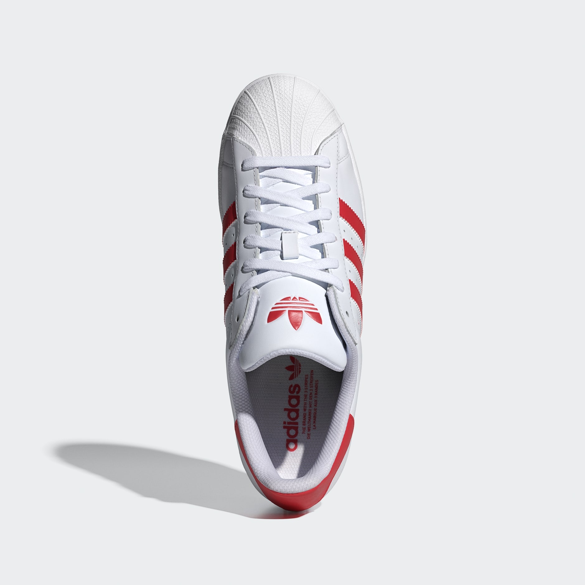 Adidas superstar white with red stripes on sale