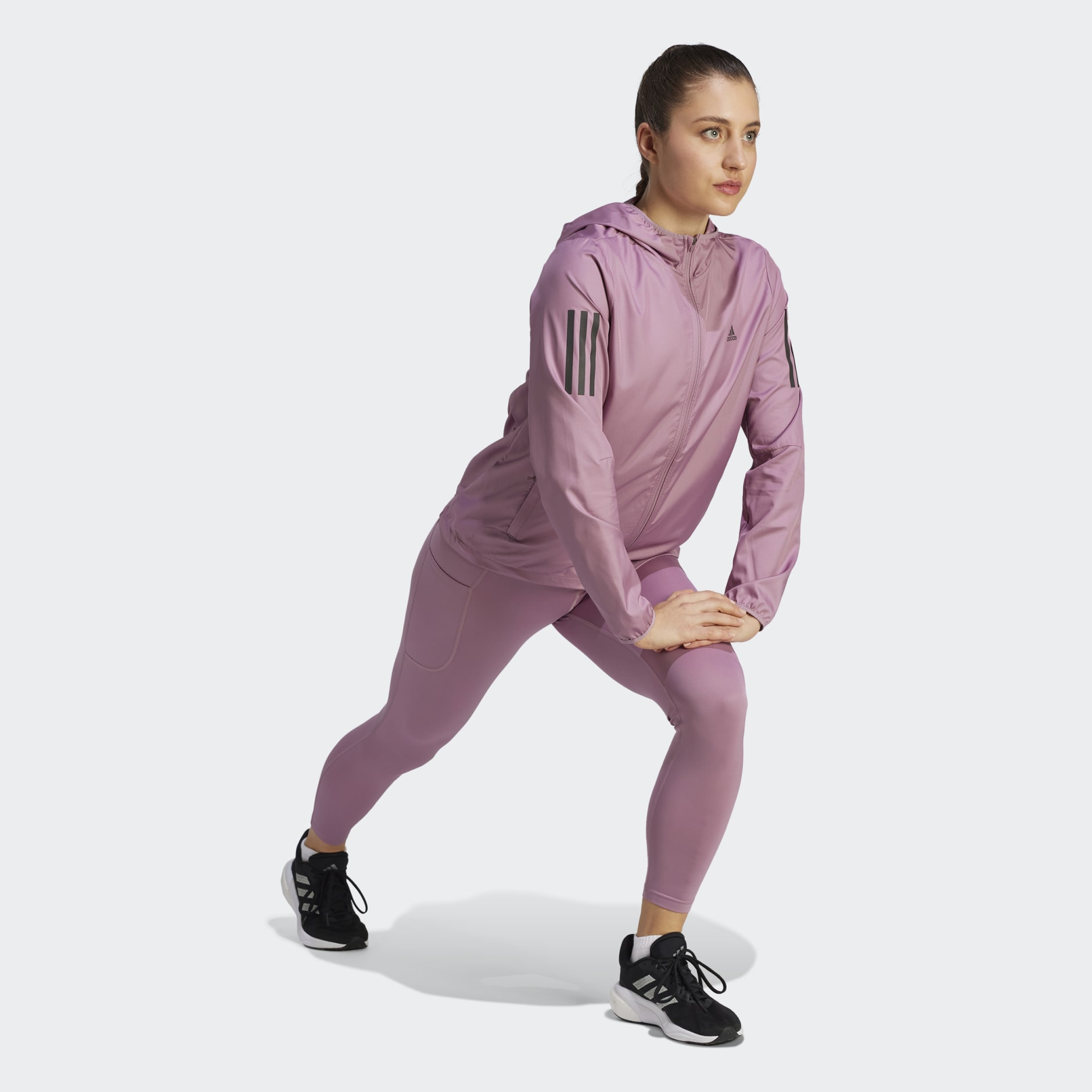 Clothing - Own the Run Hooded Running Windbreaker - Pink