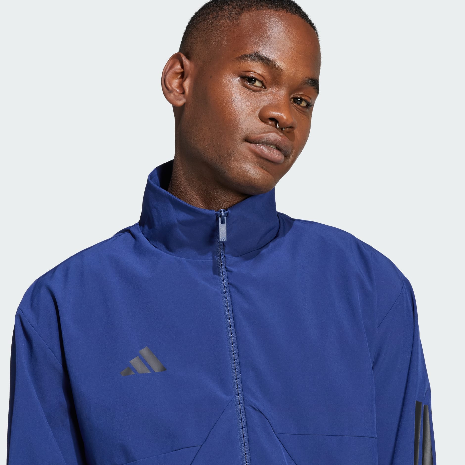 House of Tiro Woven Track Top